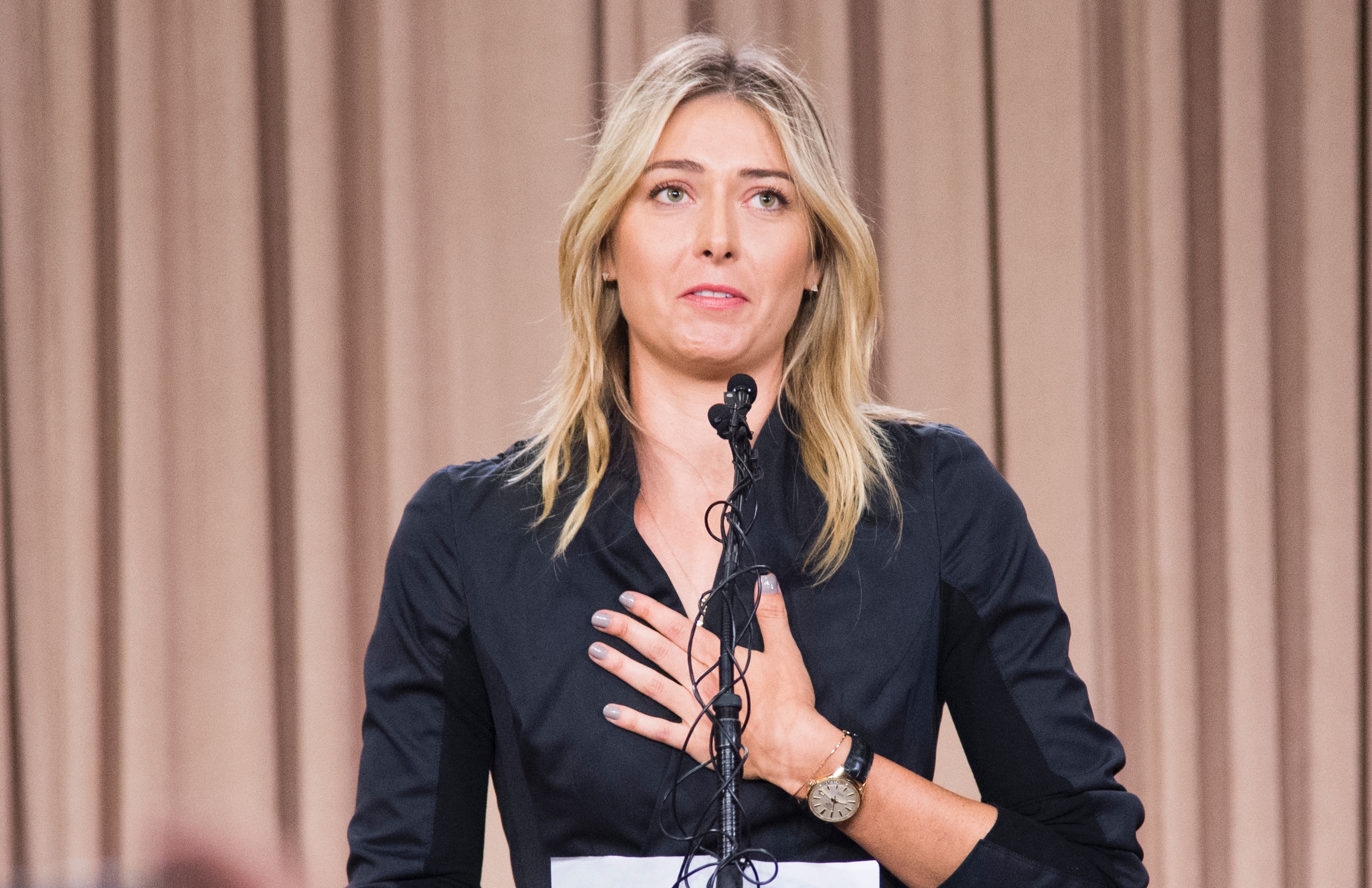Sharapova starts to count cost of failed drug test, likely ban
