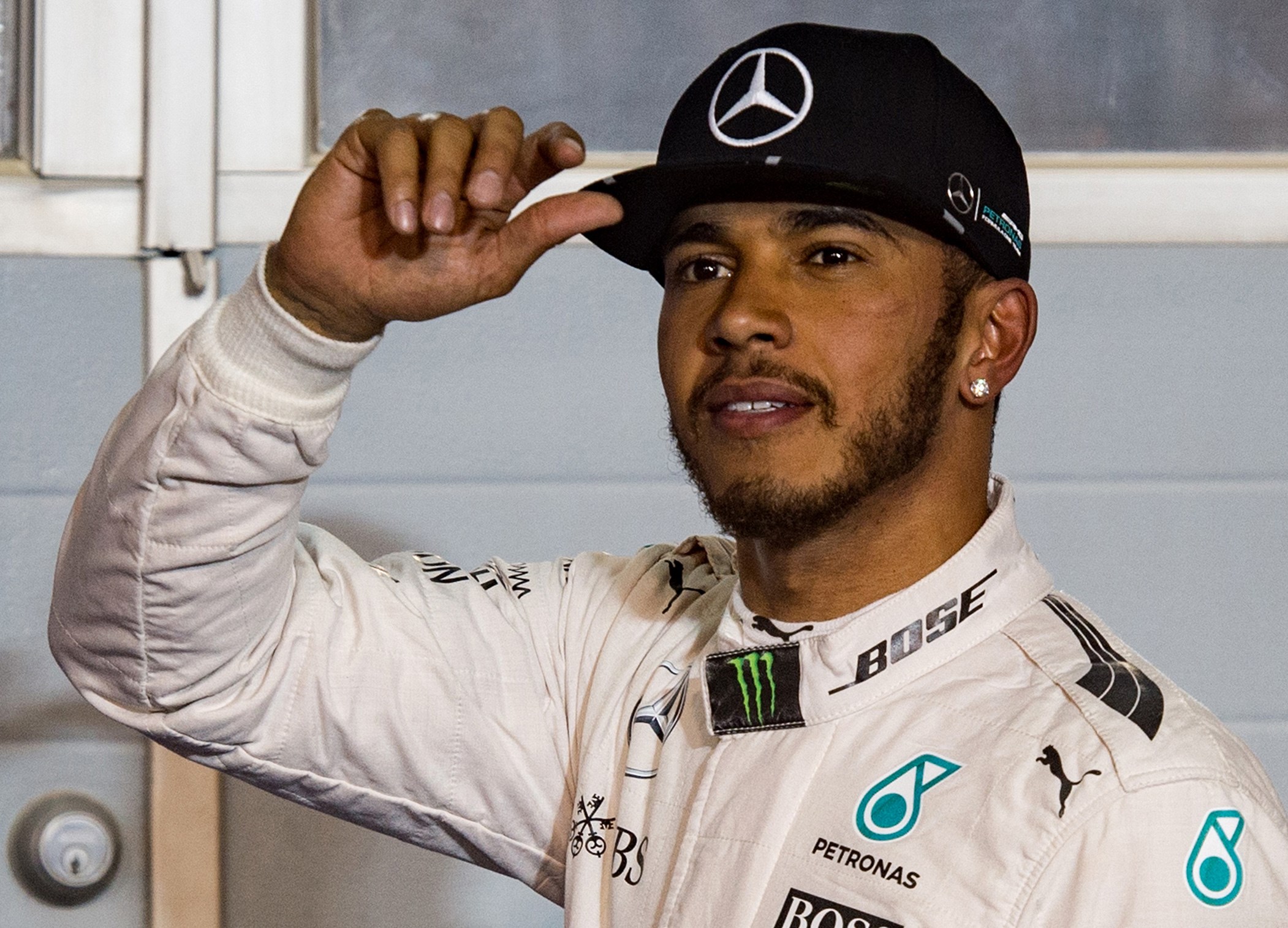 Hamilton smashes record to grab Bahrain pole