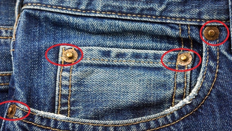ما فائدة الأزرار على جيوب بنطلون "الجينز"؟