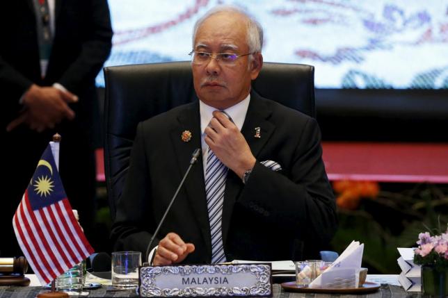 Malaysia's scandal-hit Najib seeks big win in Borneo state polls