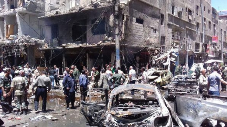 عشرون قتيلا في انفجارين استهدفا منطقة السيدة زينب بجنوب دمشق