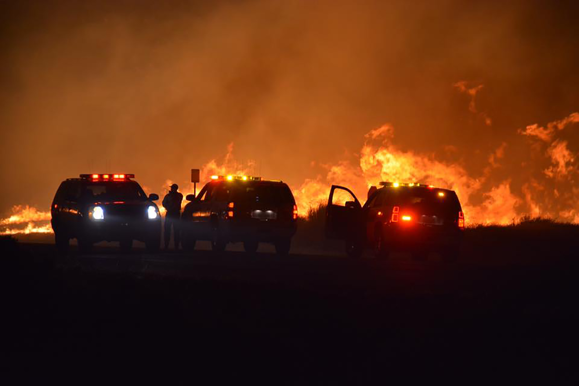Two dead, homes burned by massive California wildfire