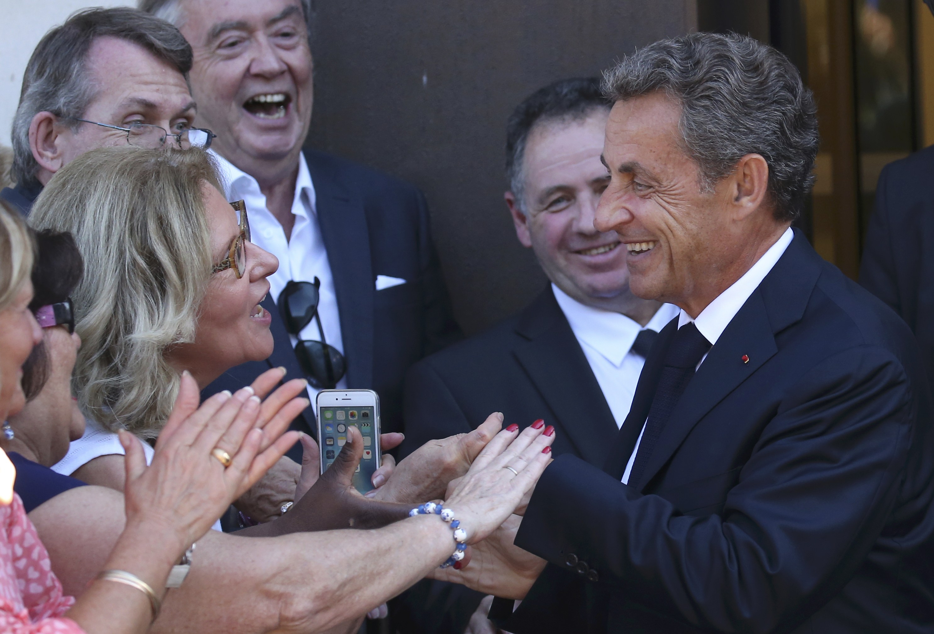Sarkozy presidential bid seeks to tap mood shift after France attacks