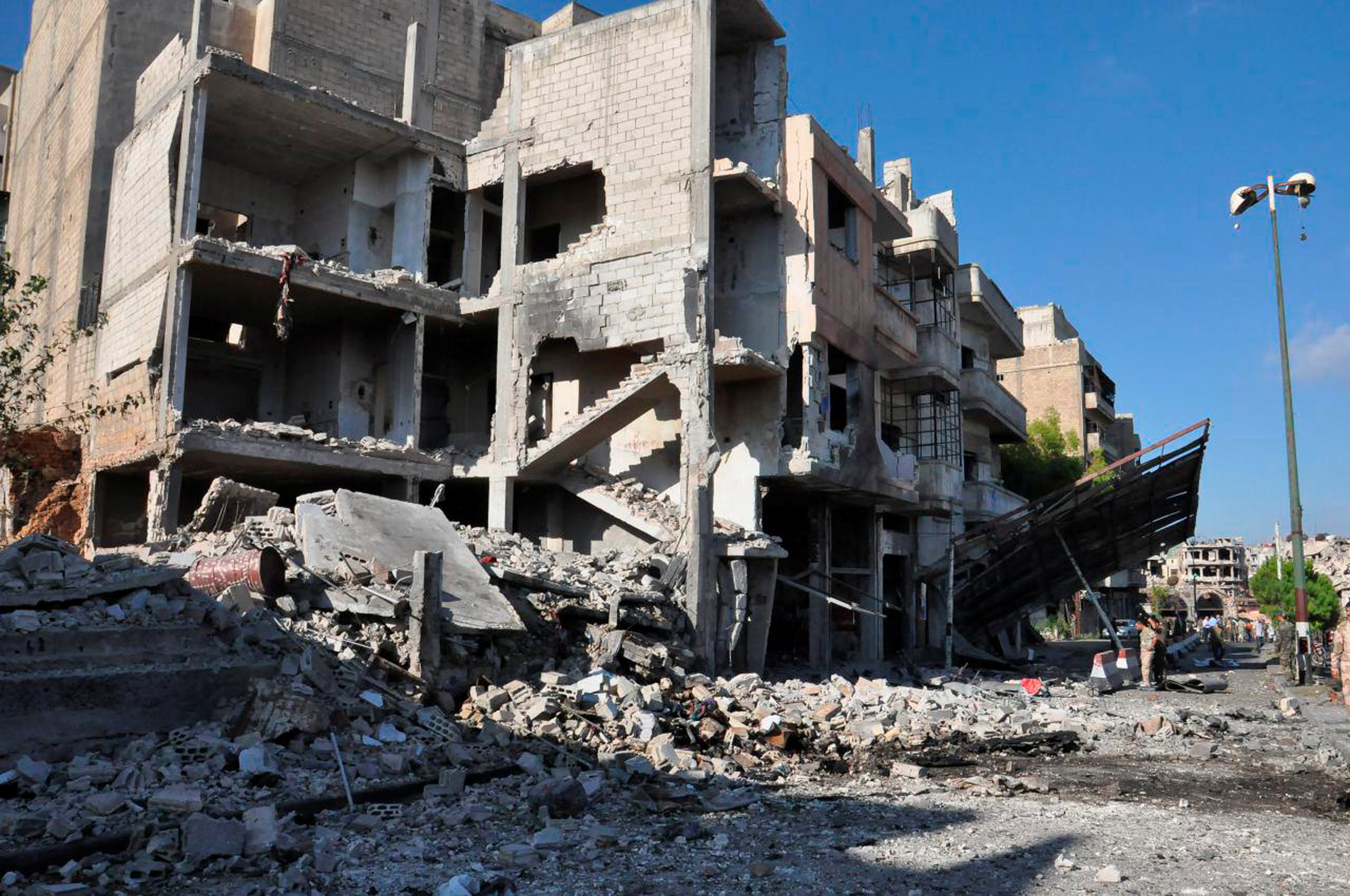 Blasts hit govt-held and Kurdish parts of Syria -state media, monitor