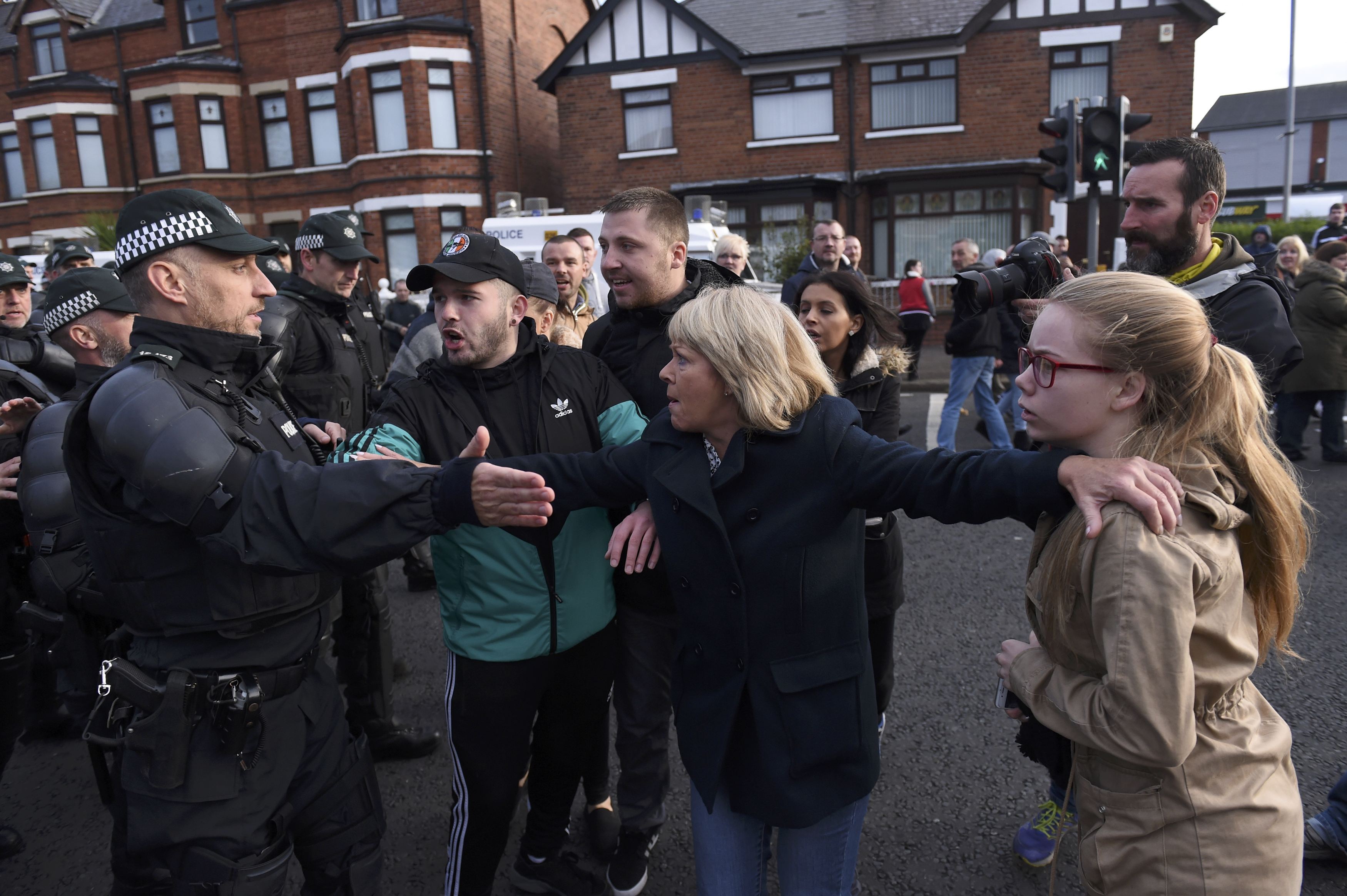 Belfast protest ends as police let parade pass after three years