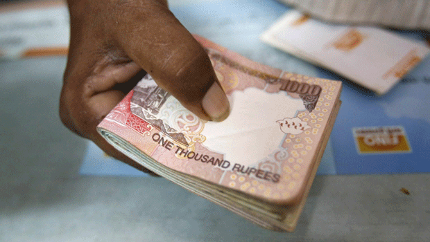 Indians in Oman put off home trip over currency crisis