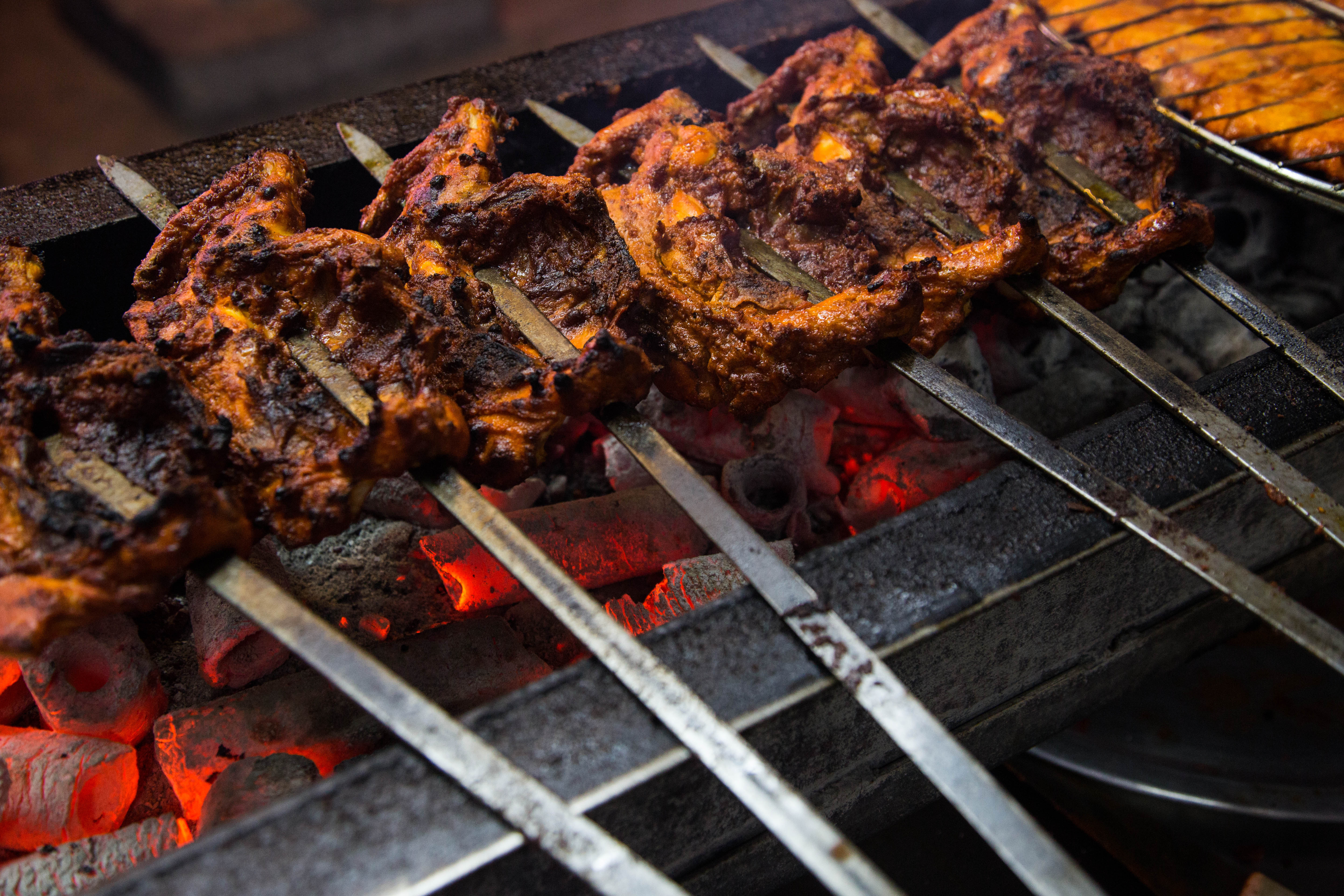 Where can you find delicious street food in Oman?