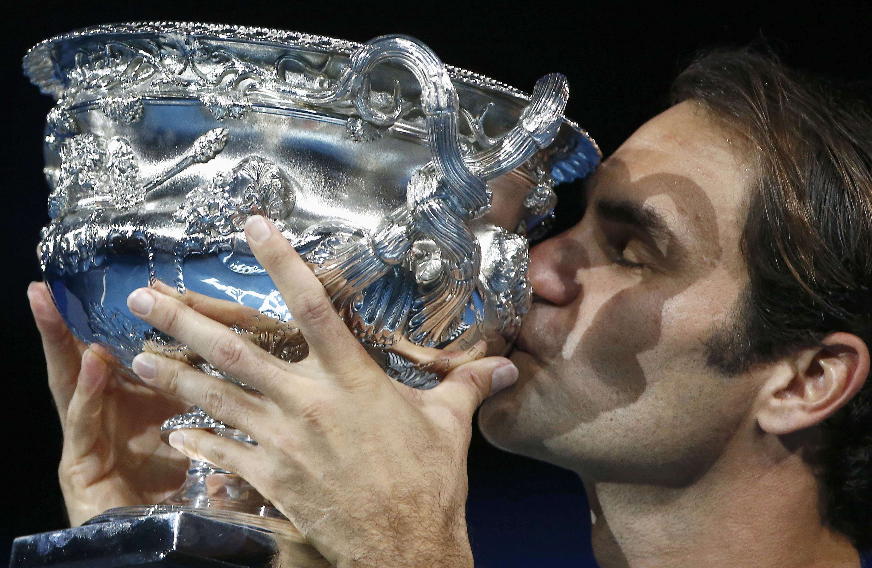 Tennis: Emotional Federer savours long-awaited 18th Slam win