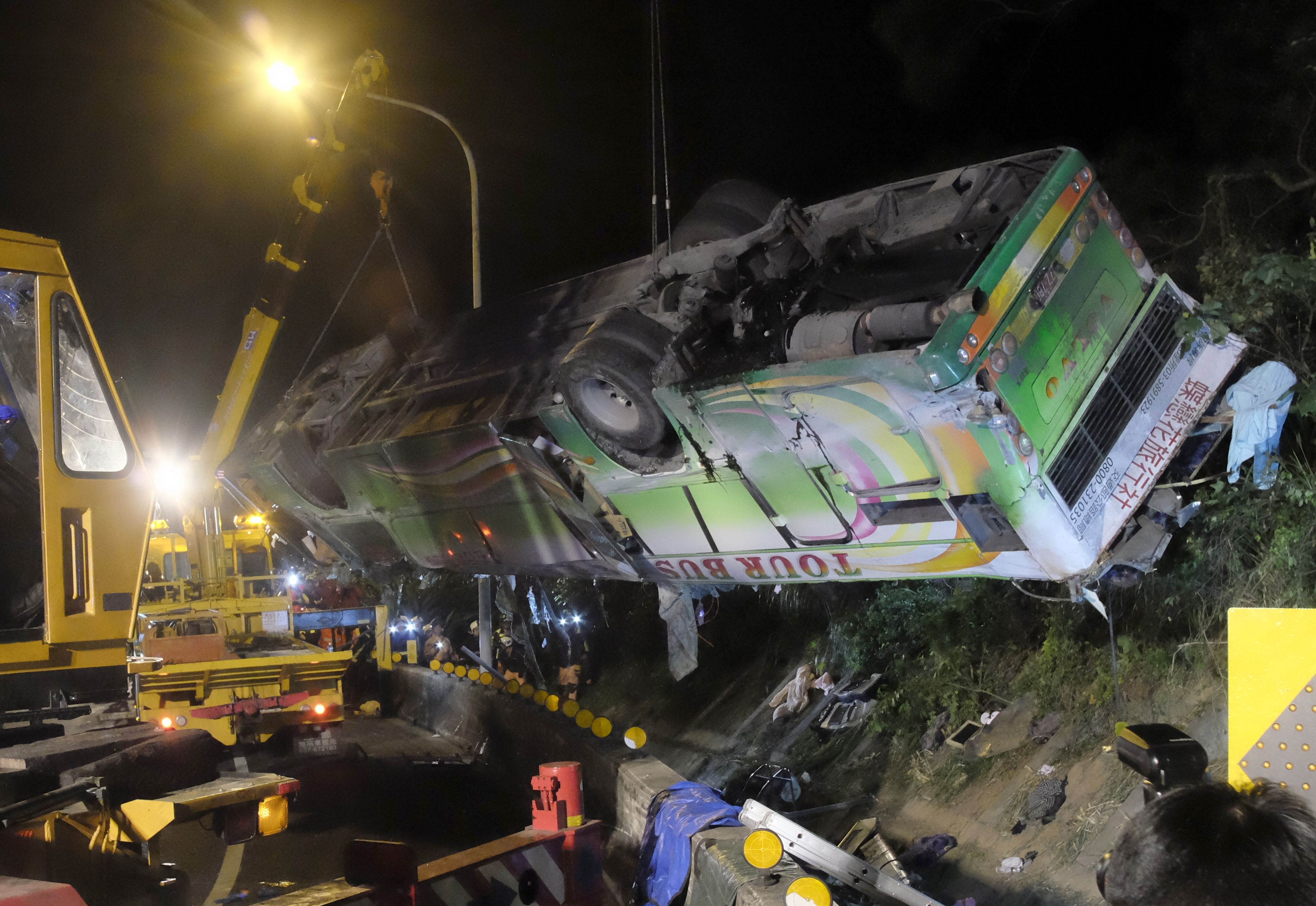 Tour bus crashes in Taiwan, at least 32 dead