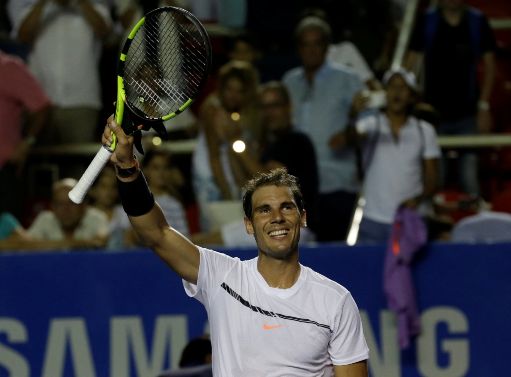 Tennis - Nadal, Djokovic advance in Acapulco