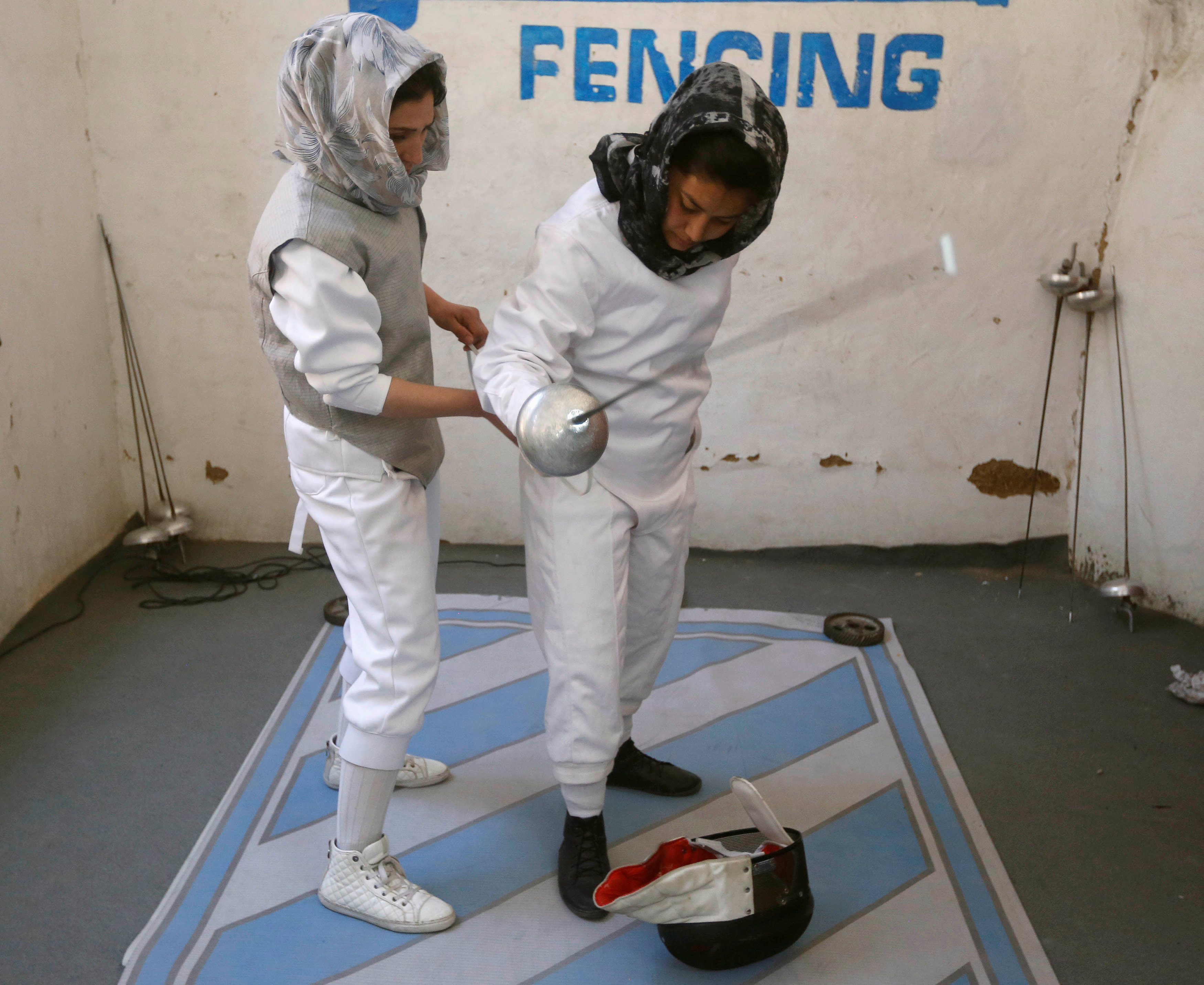 Afghan women fencers aim to parry prejudice