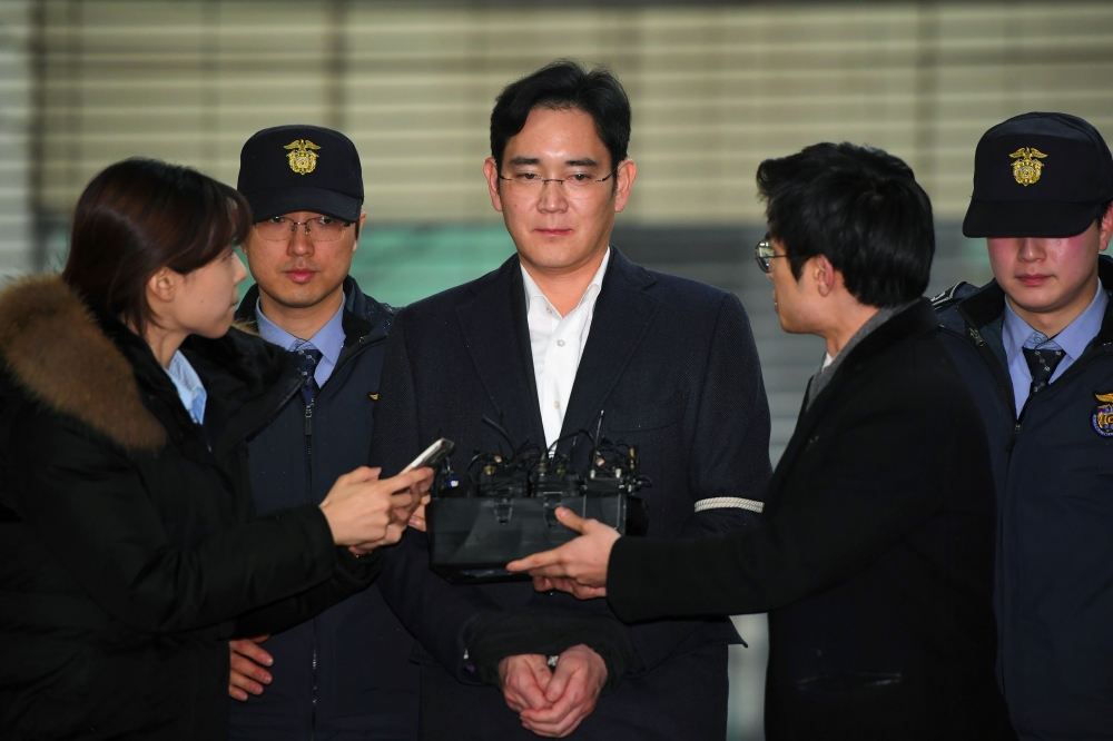 Samsung Group chief denies all charges as "trial of the century" begins