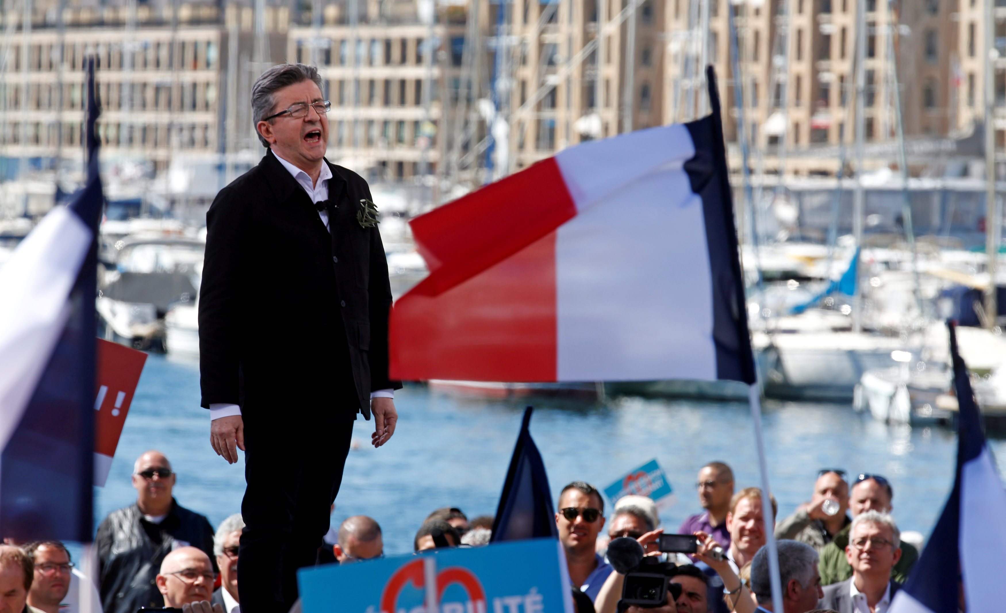 Macron, Le Pen hold French election lead but investors eye Melenchon surge