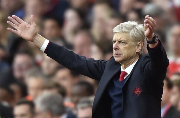 Retirement is like dying for Arsenal manager Wenger