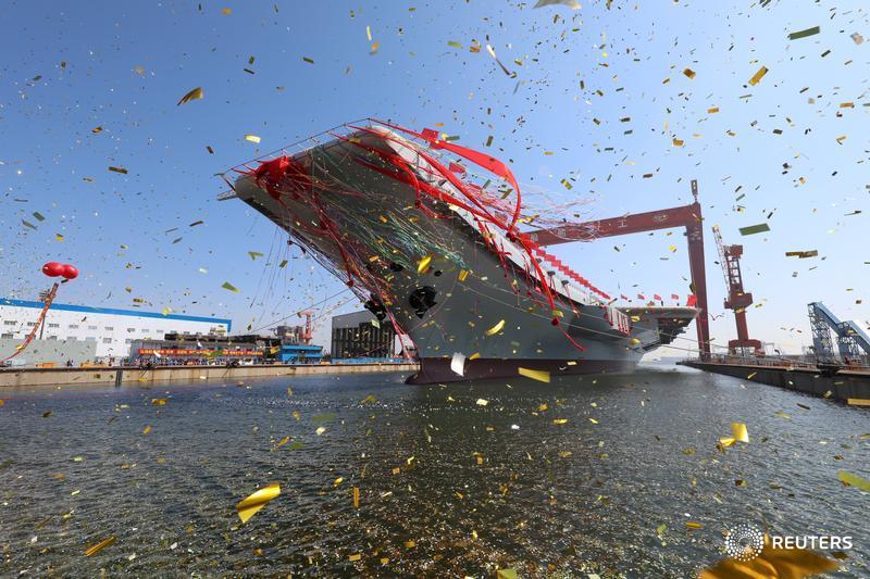 China launches first home-built aircraft carrier amid S.China Sea tension