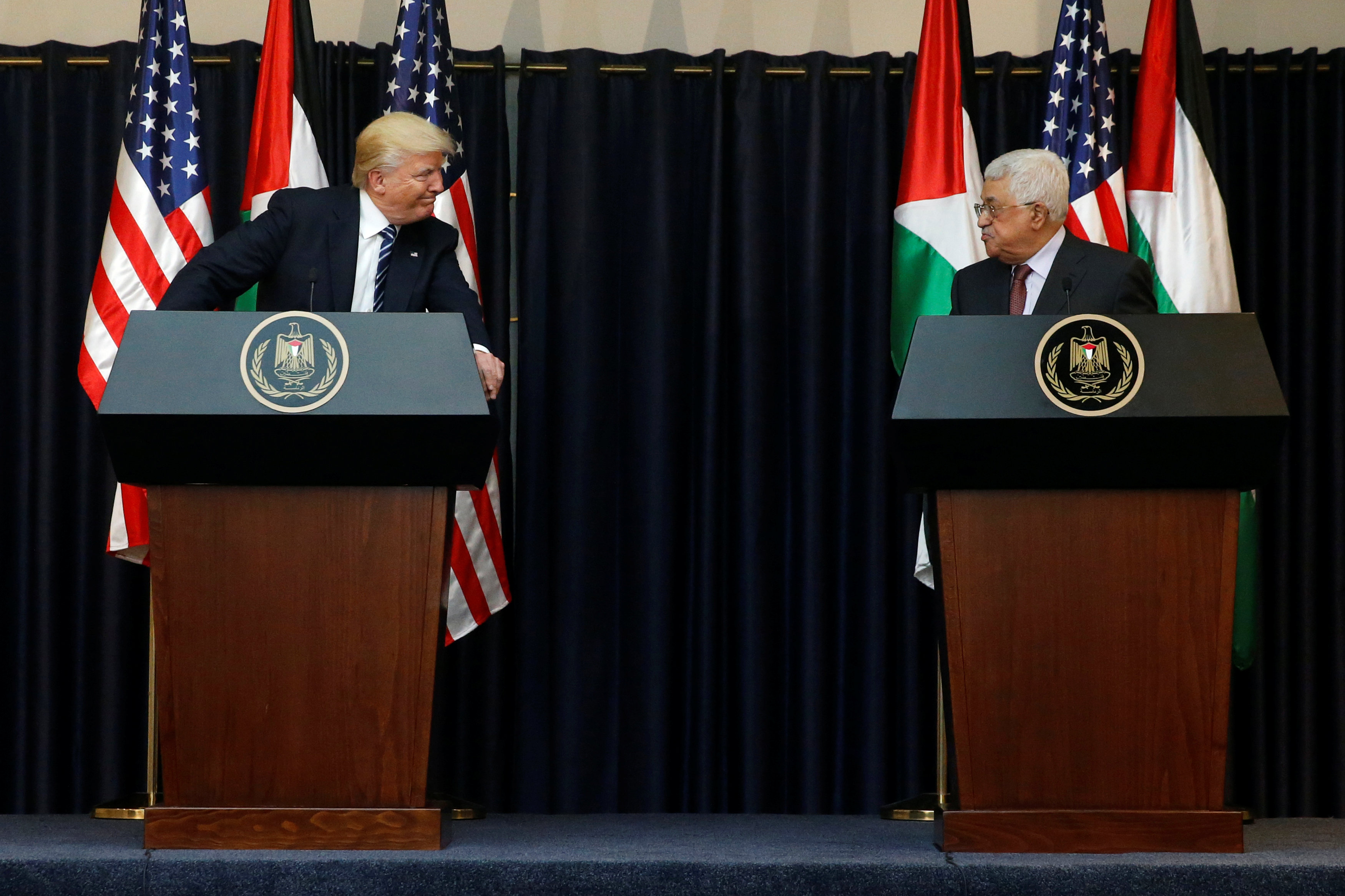 Trump plays up Middle East peace prospects after talks with Abbas