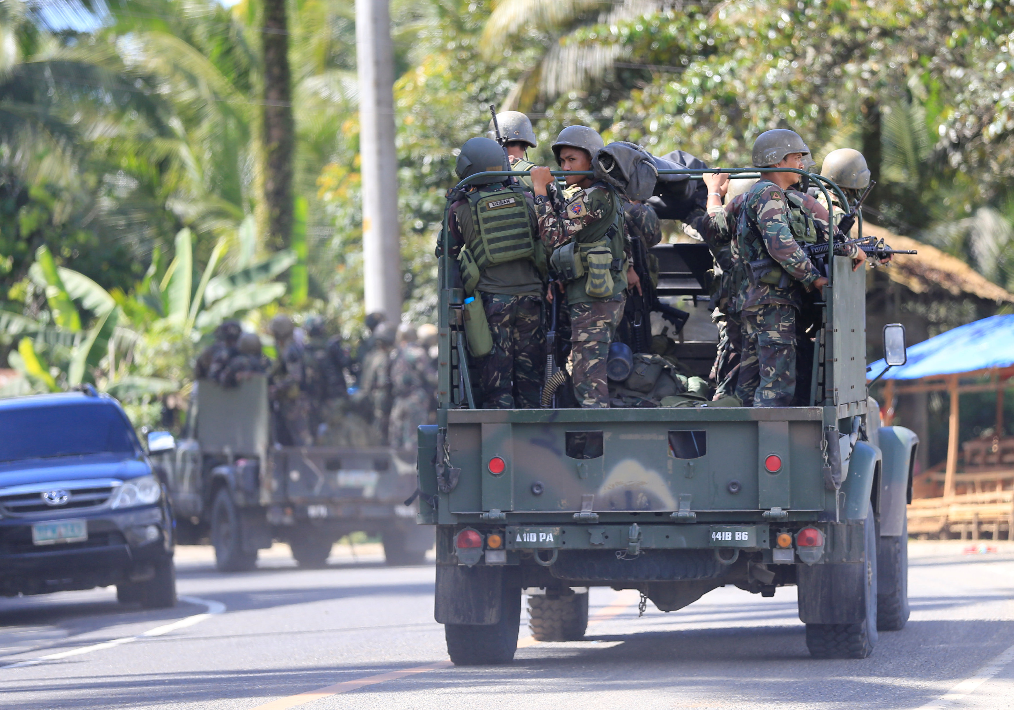 Duterte warns of harsh measures as civilians flee fighting in Mindanao