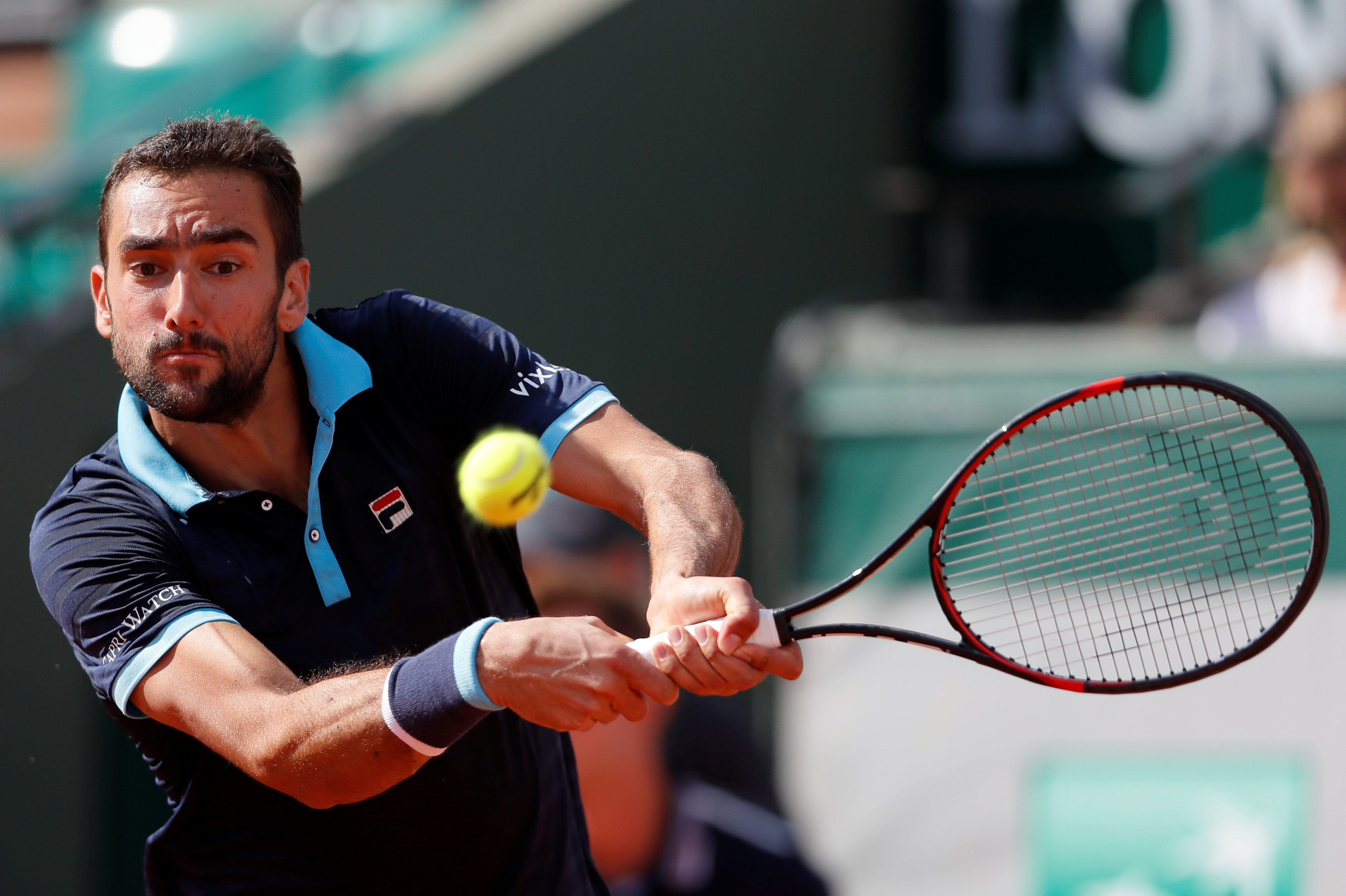 Tennis: Cilic flies under the radar all the way to last eight