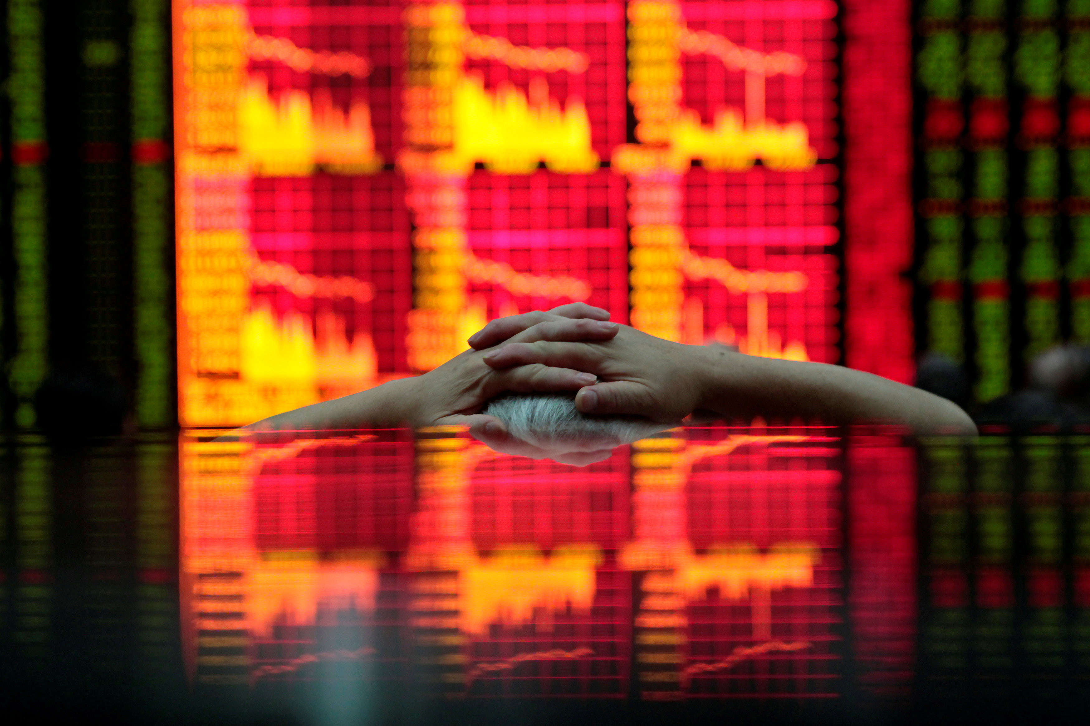 China stocks end firmer, investors await economic data