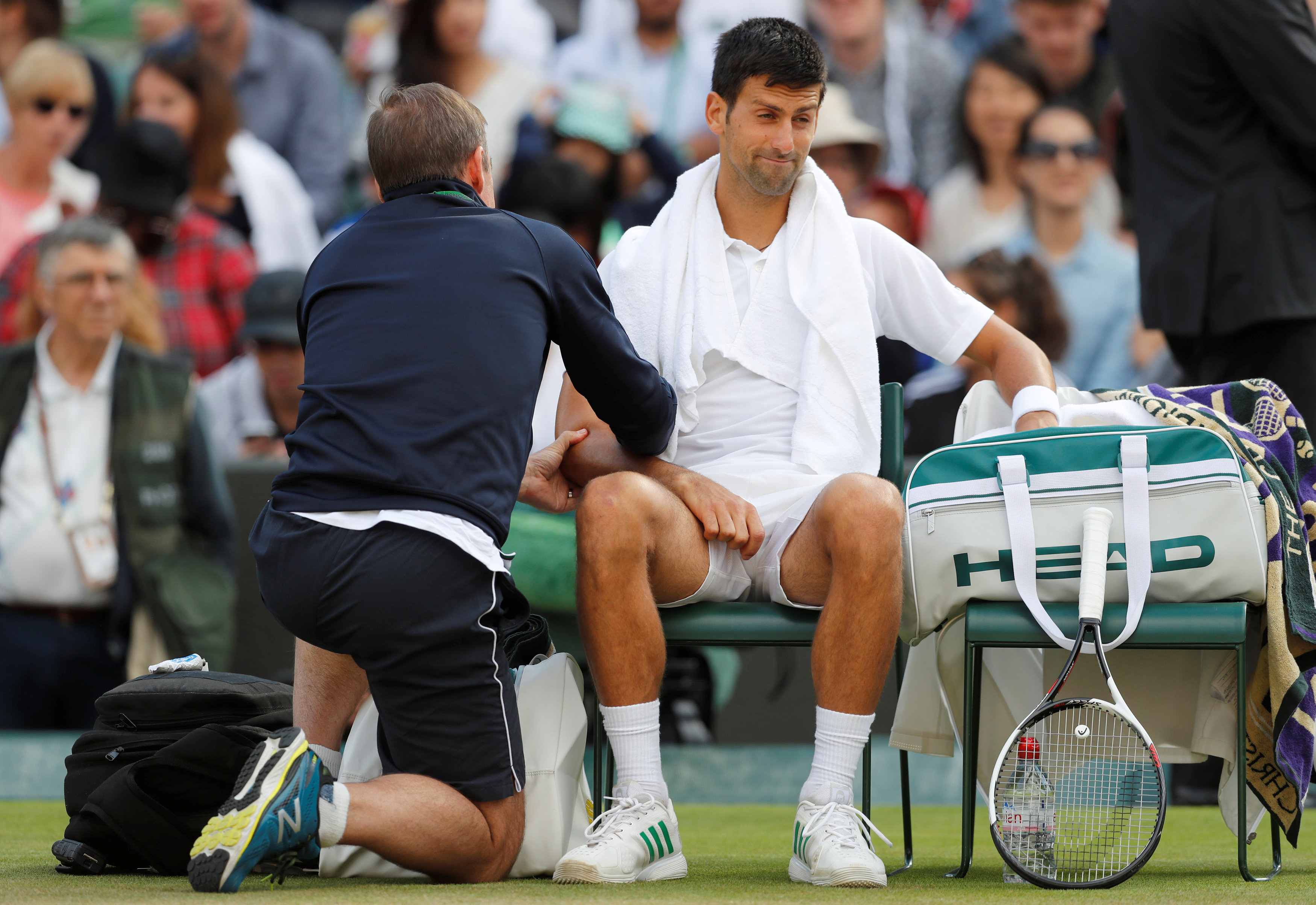 Tennis: Djokovic retires hurt in Wimbledon quarterfinal against Berdych