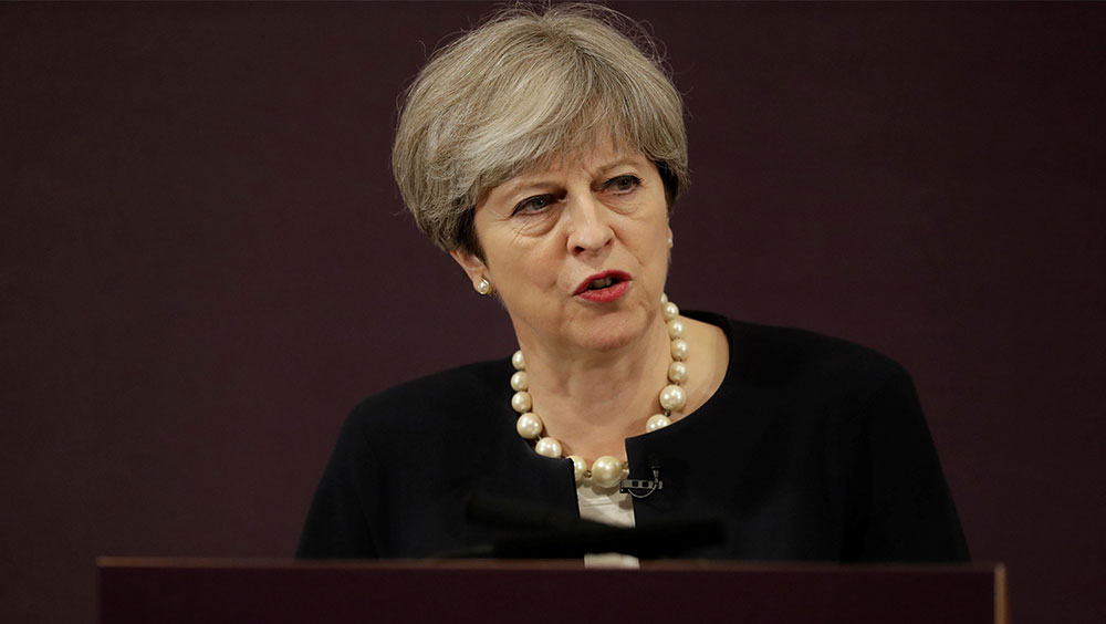 UK PM May shed a "little tear" over election failure