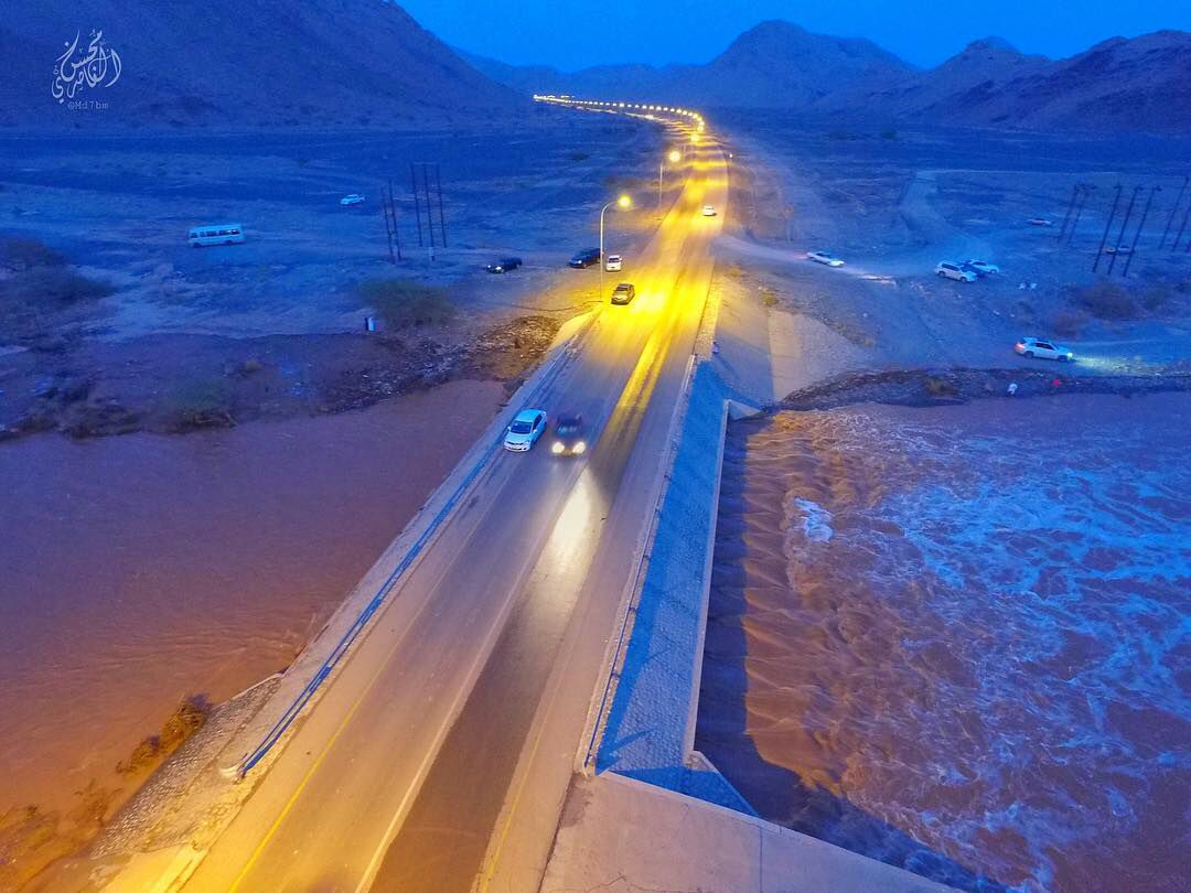 In picture: Rain wrecks road, school in Oman