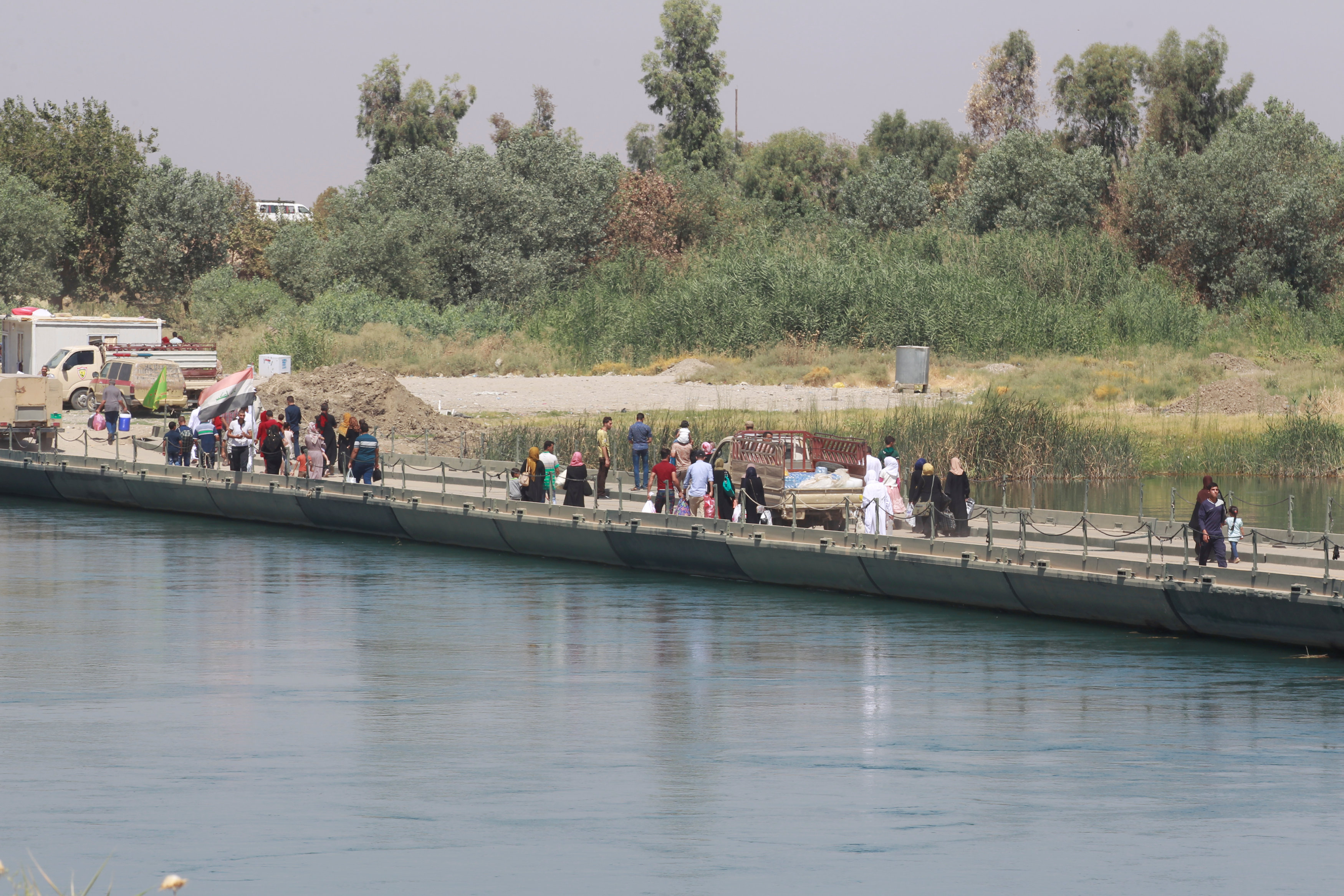 Iraqi bridge is sole link for Mosul residents rebuilding lives