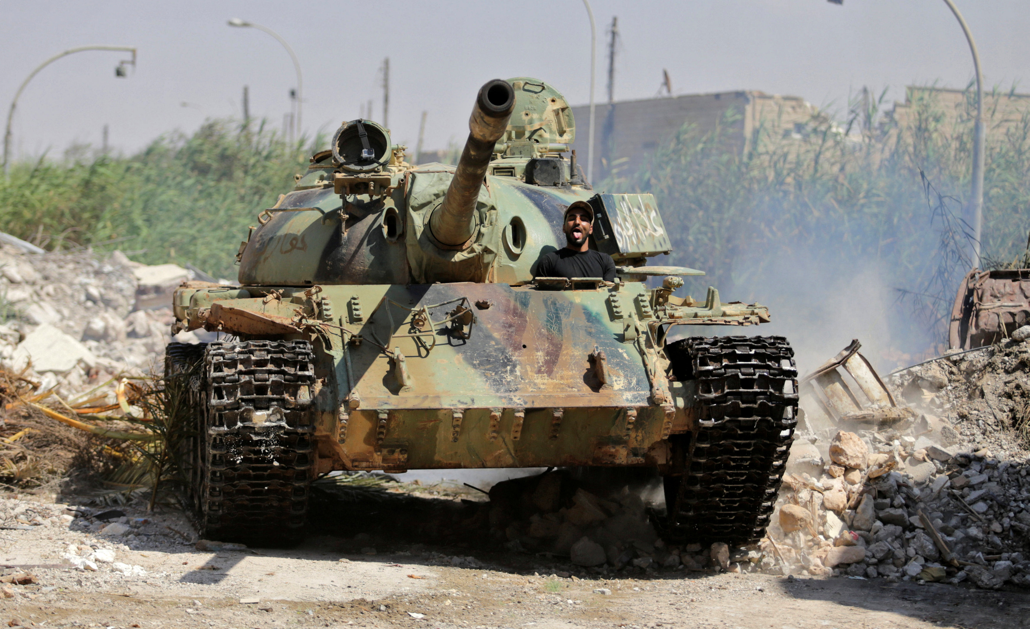 Eastern commander's forces battle resistance in Libya's Benghazi
