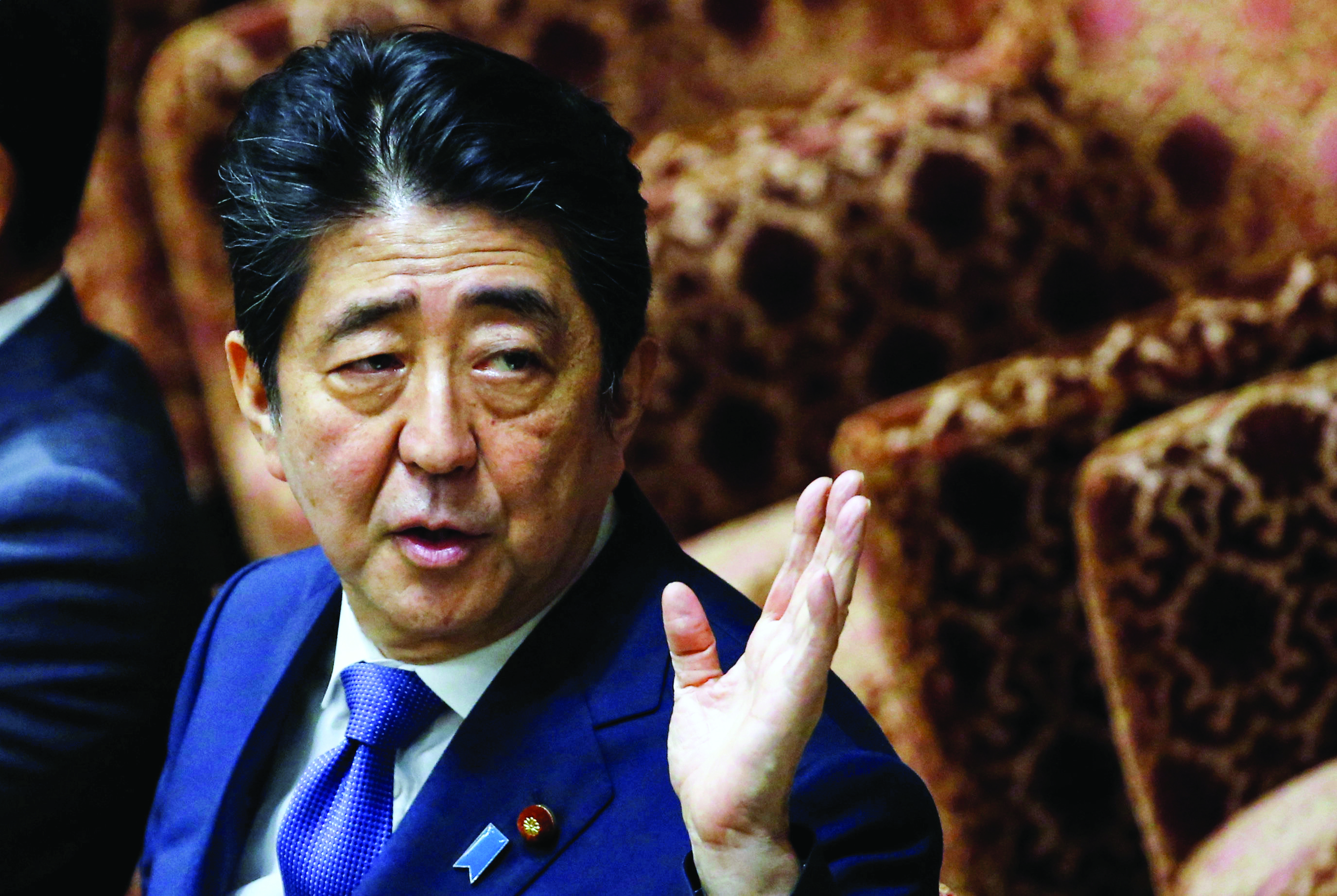 Japanese prime minister denies favours for friend amid falling support
