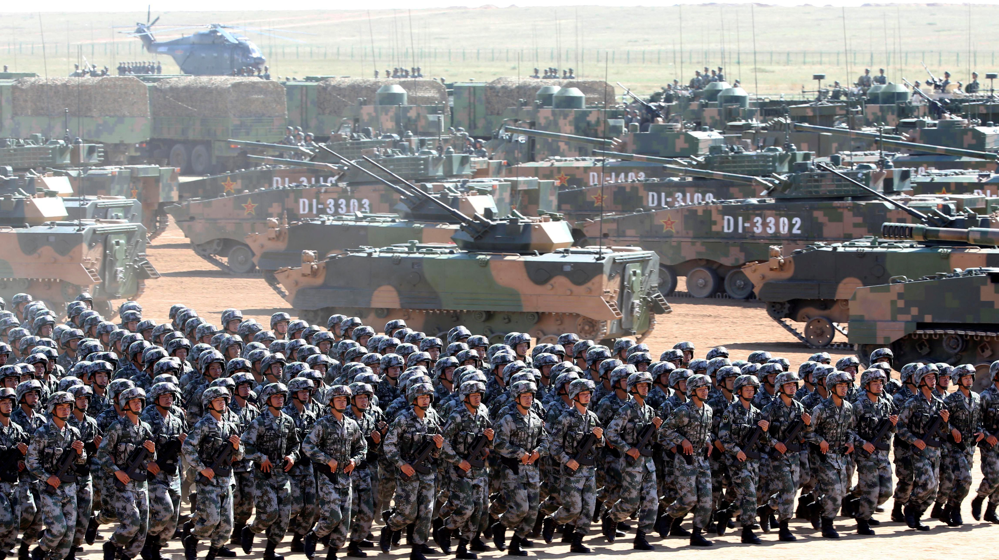 Xi calls for building elite forces during massive military parade