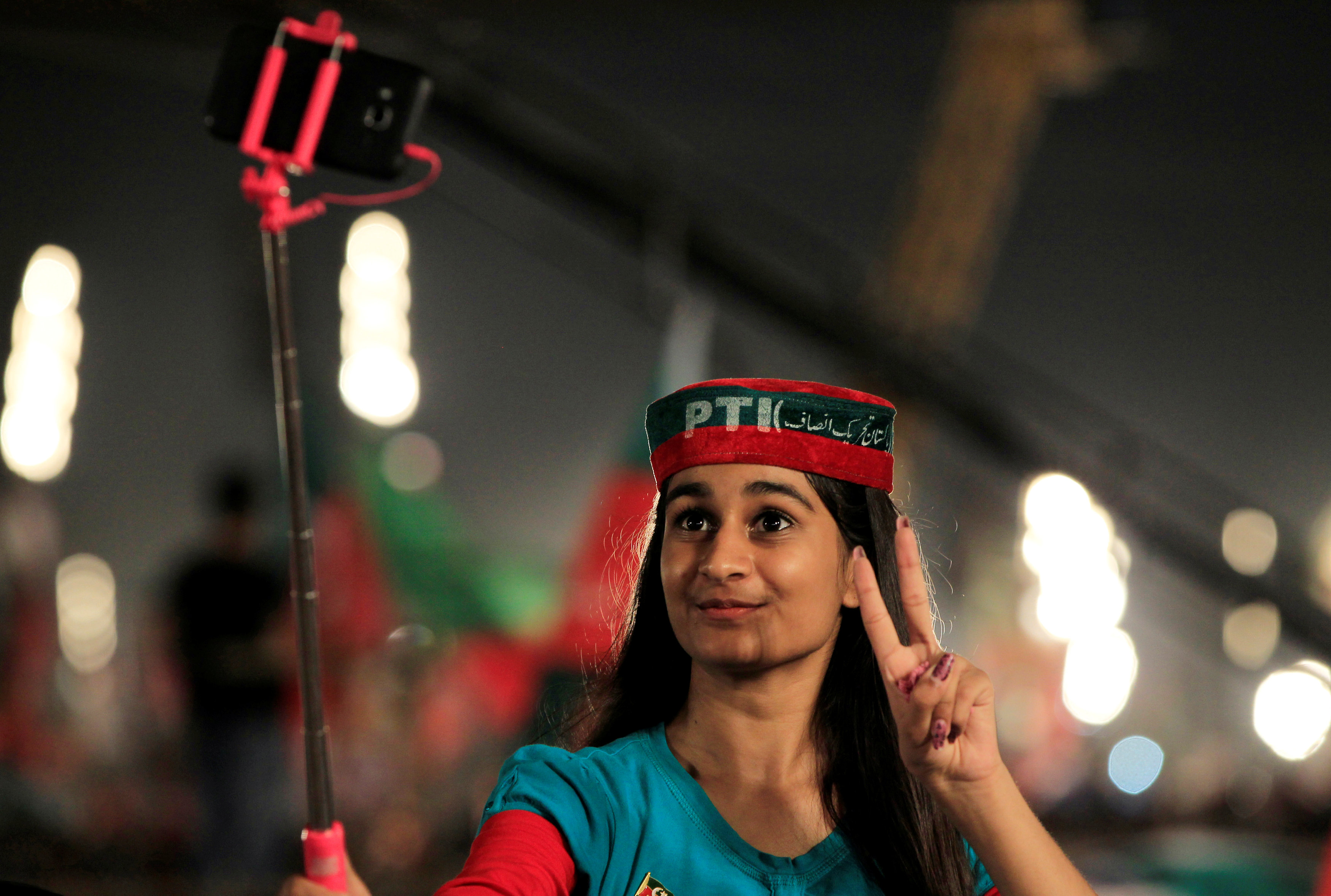 In pictures: Pakistan Tehreek-e-Insaf supporters celebrate Nawaz ouster