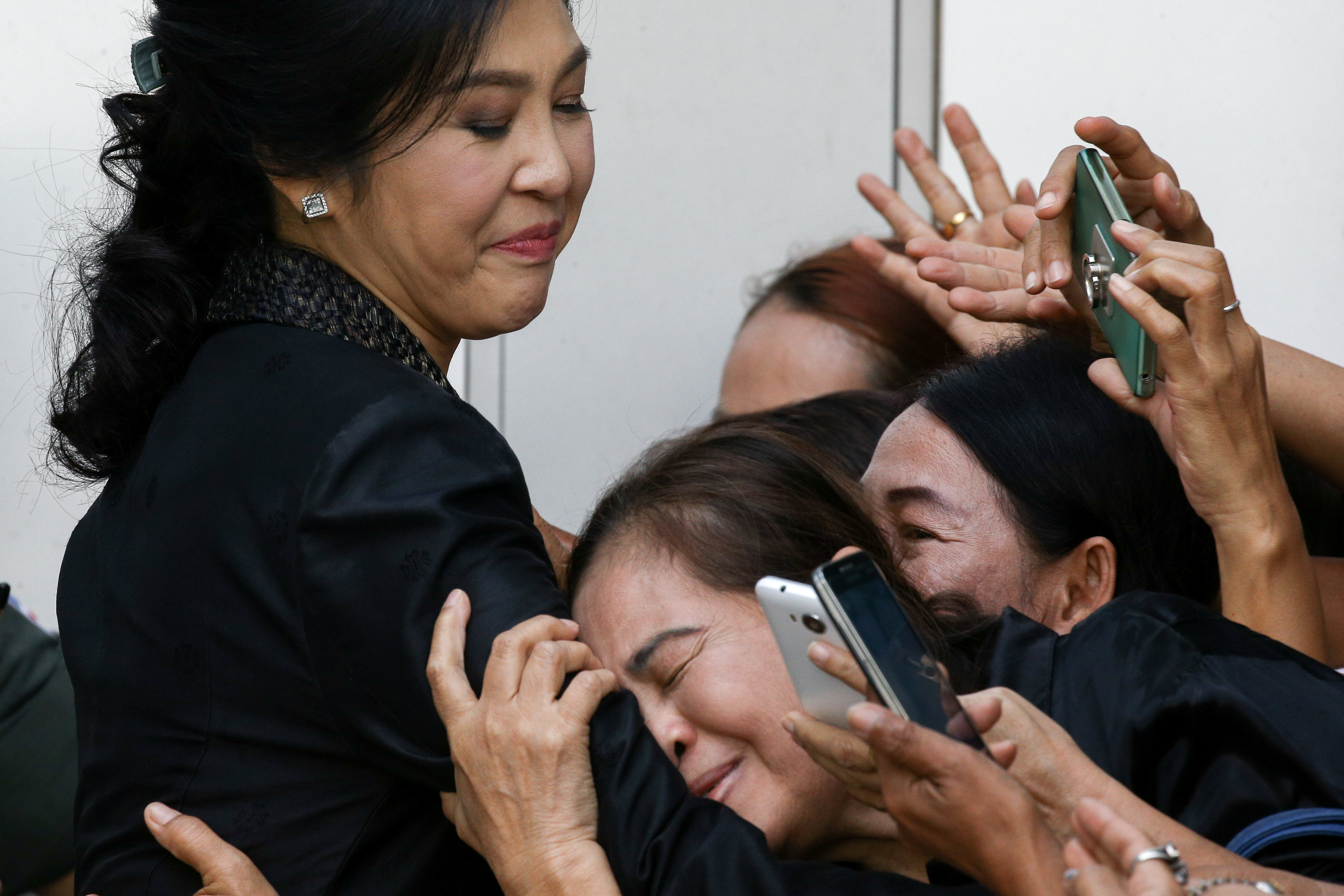 Tearful Thailand's former prime minister says she was never dishonest