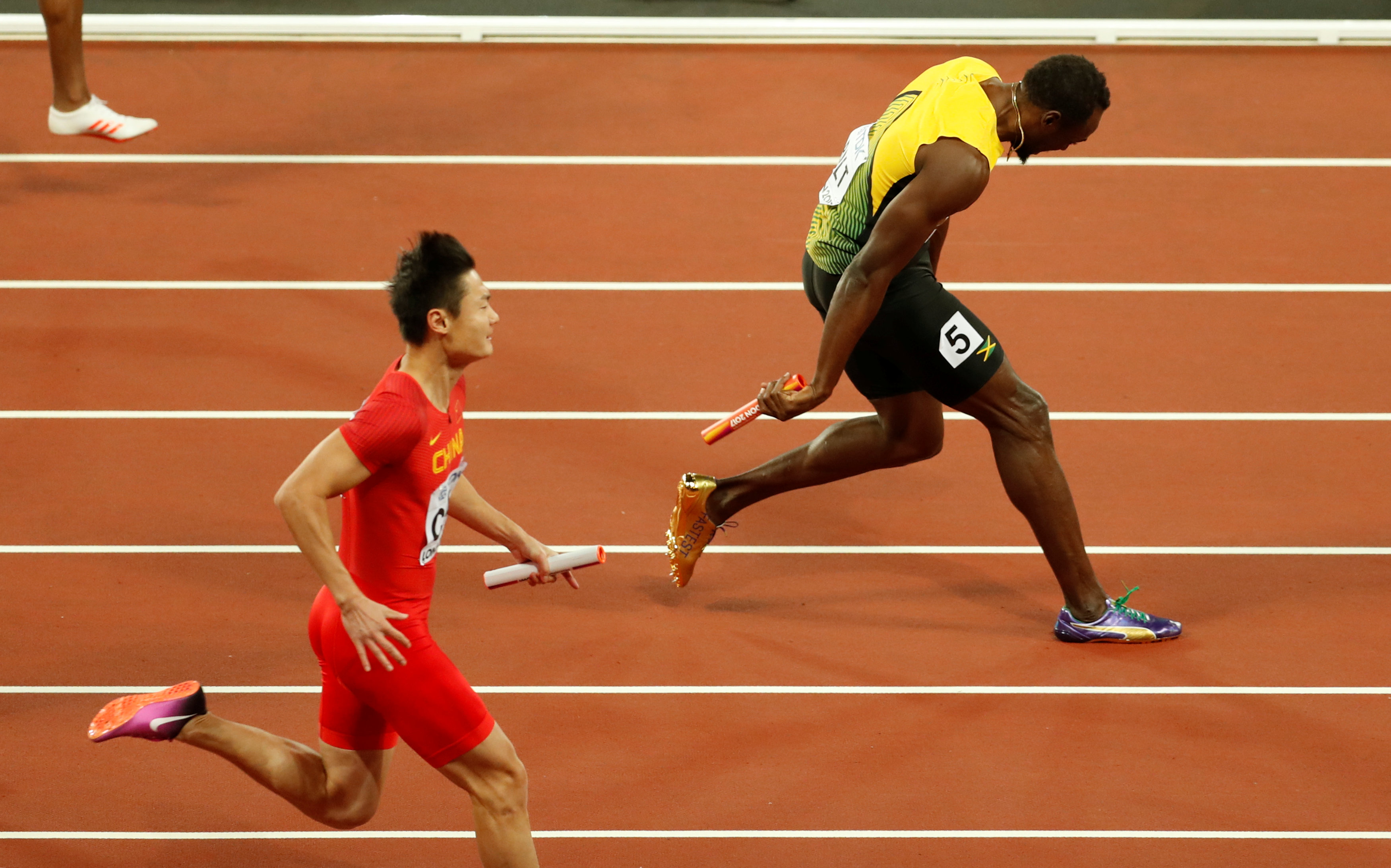 In pictures: Usain Leo Bolt suffers cramps