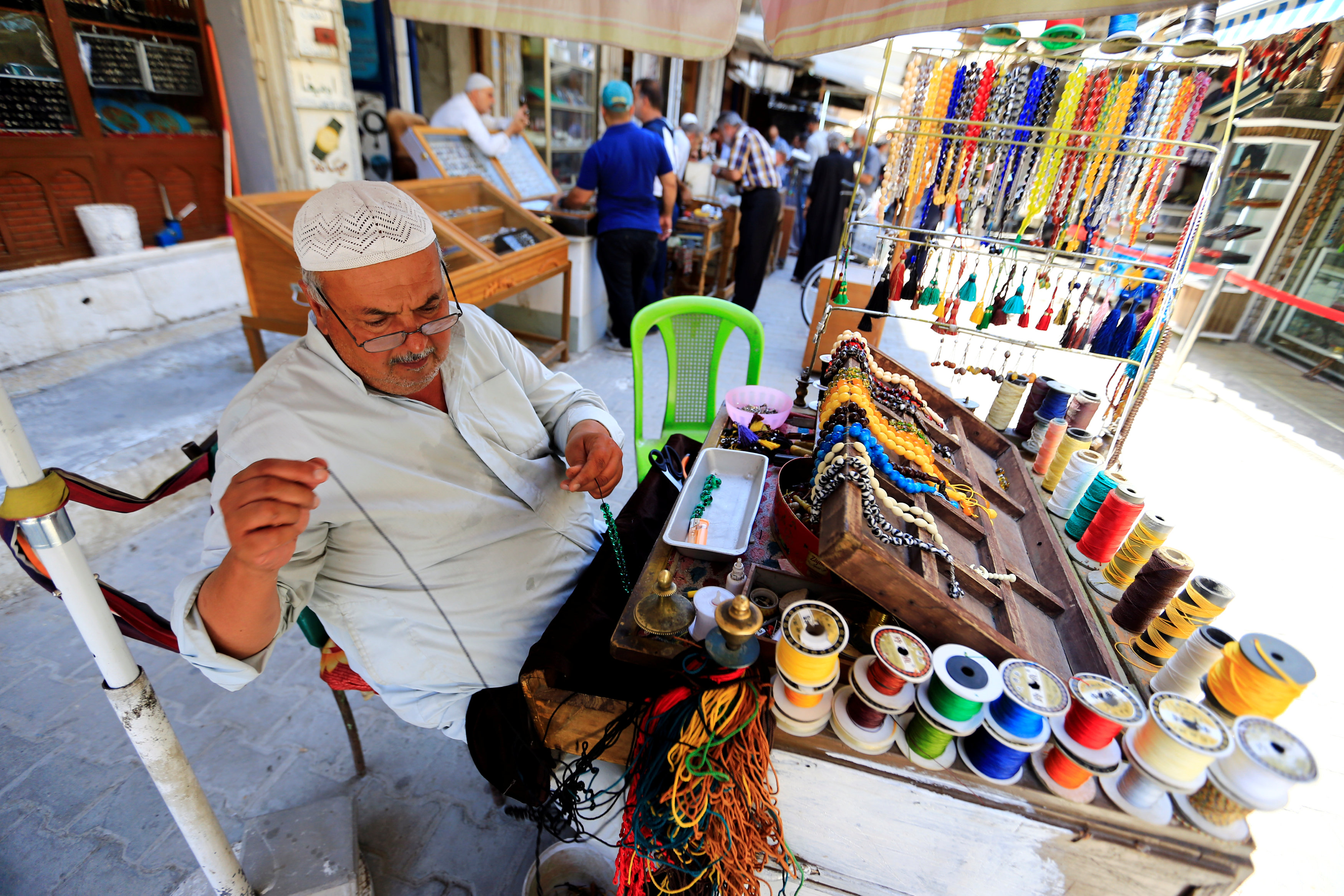 In pictures: Bead vendors at Iraq's Haraj market in Baghdad