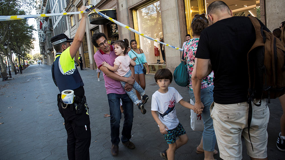 Van ploughs through crowd in Barcelona, killing 13