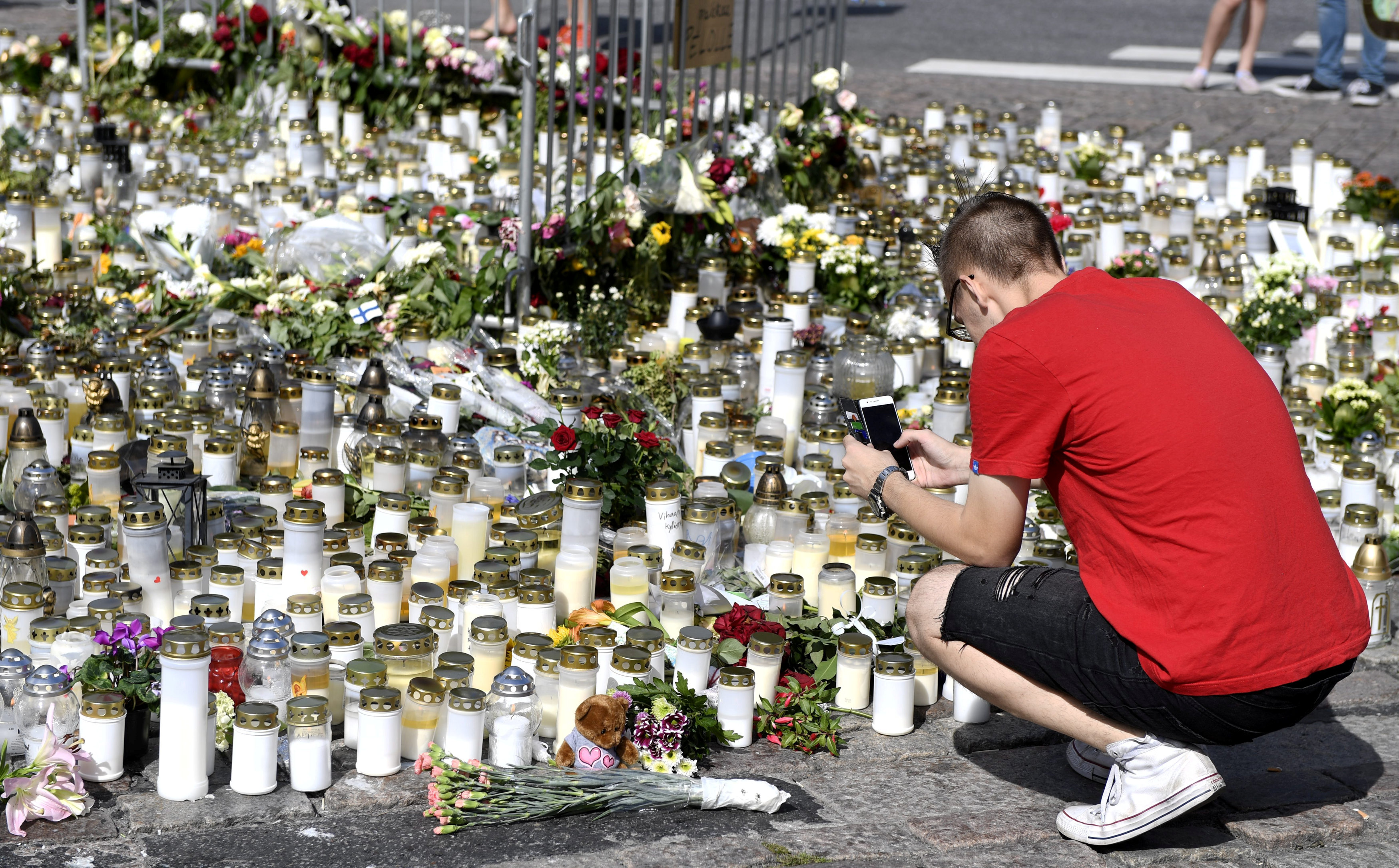 Finnish police search new sites, talk to suspect in knife rampage probe