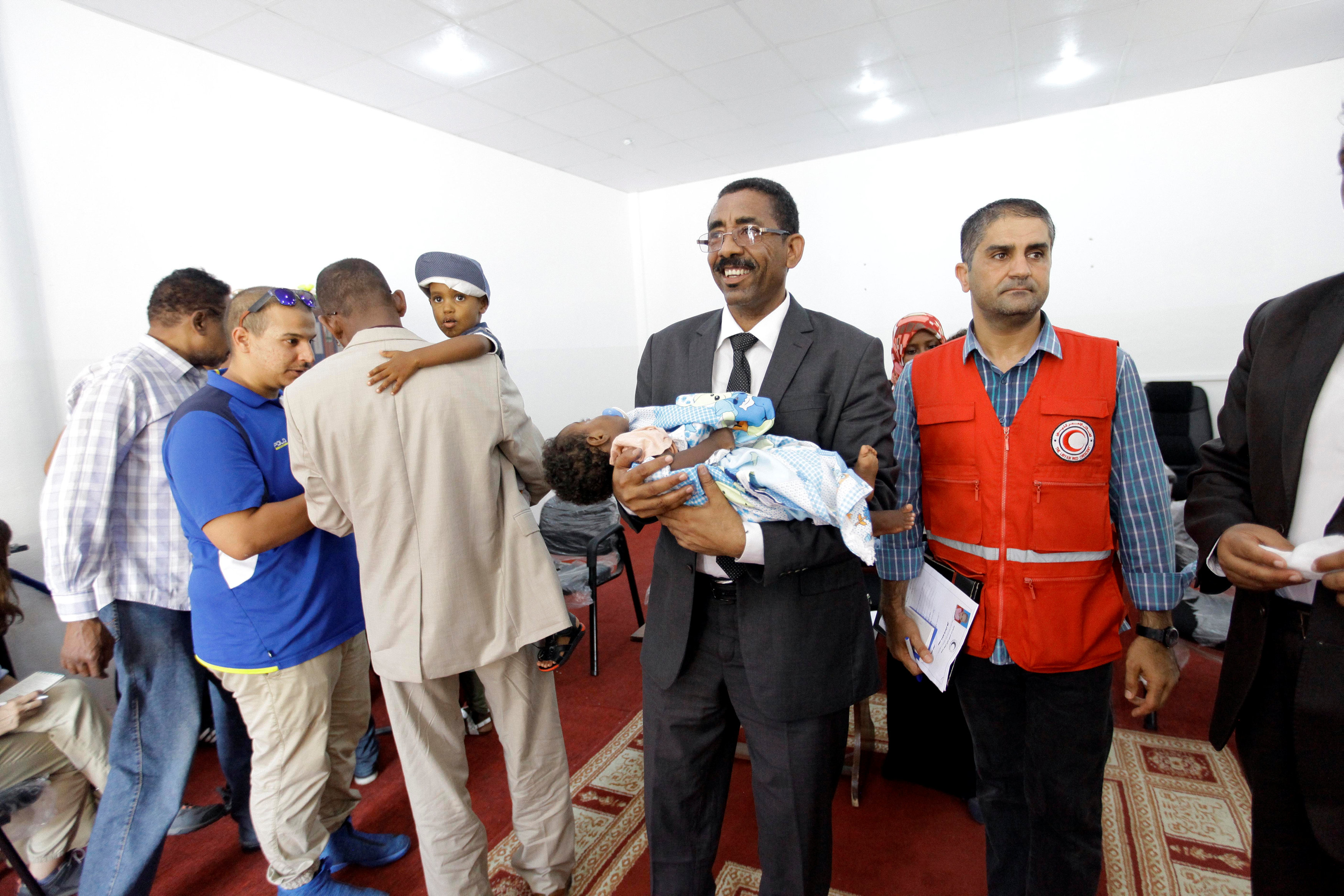 In pictures: IS militants' children handed over to Sudanese consul in Libya