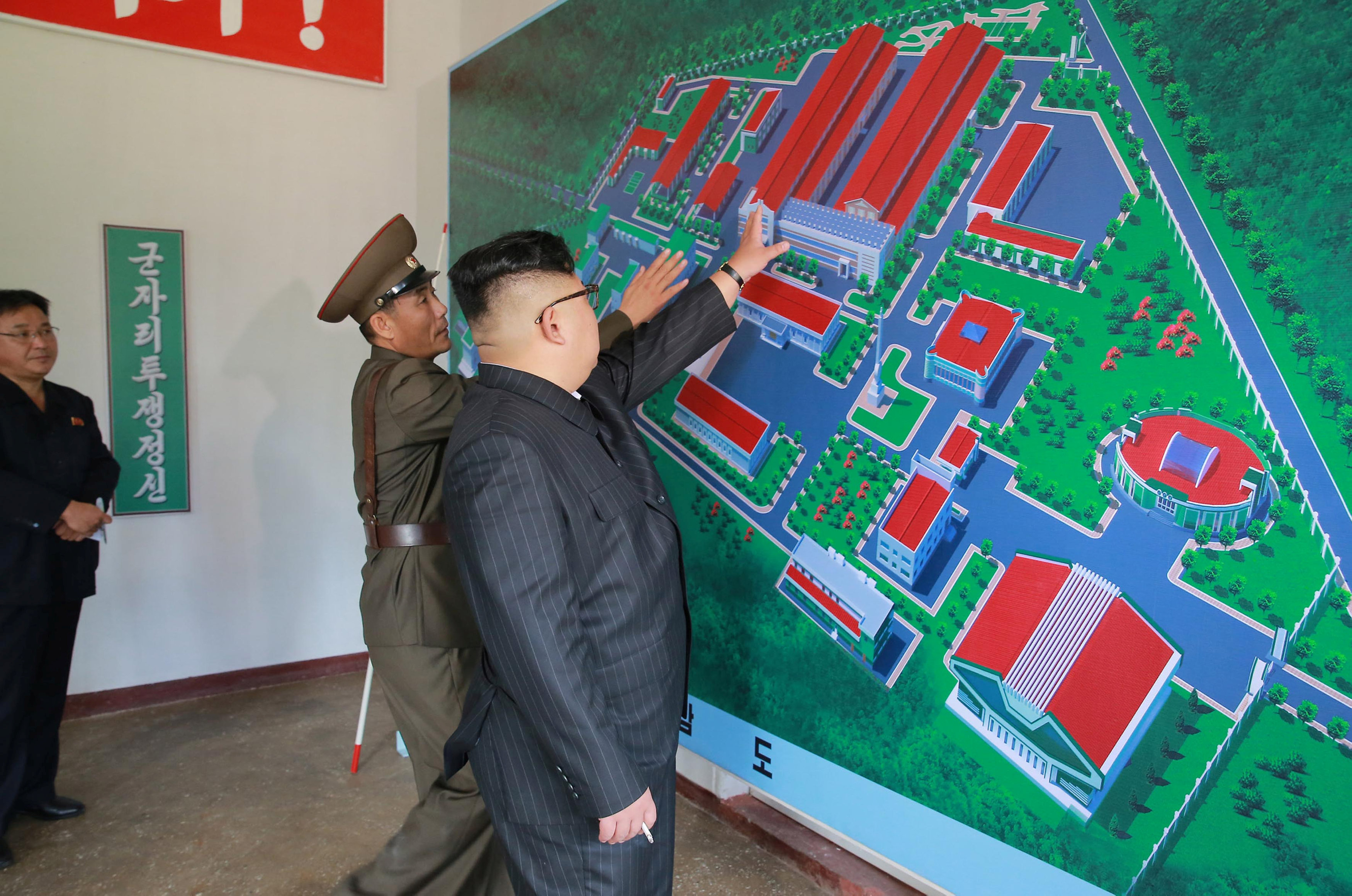 North Korean leader tours chemical plant, orders more rocket engines