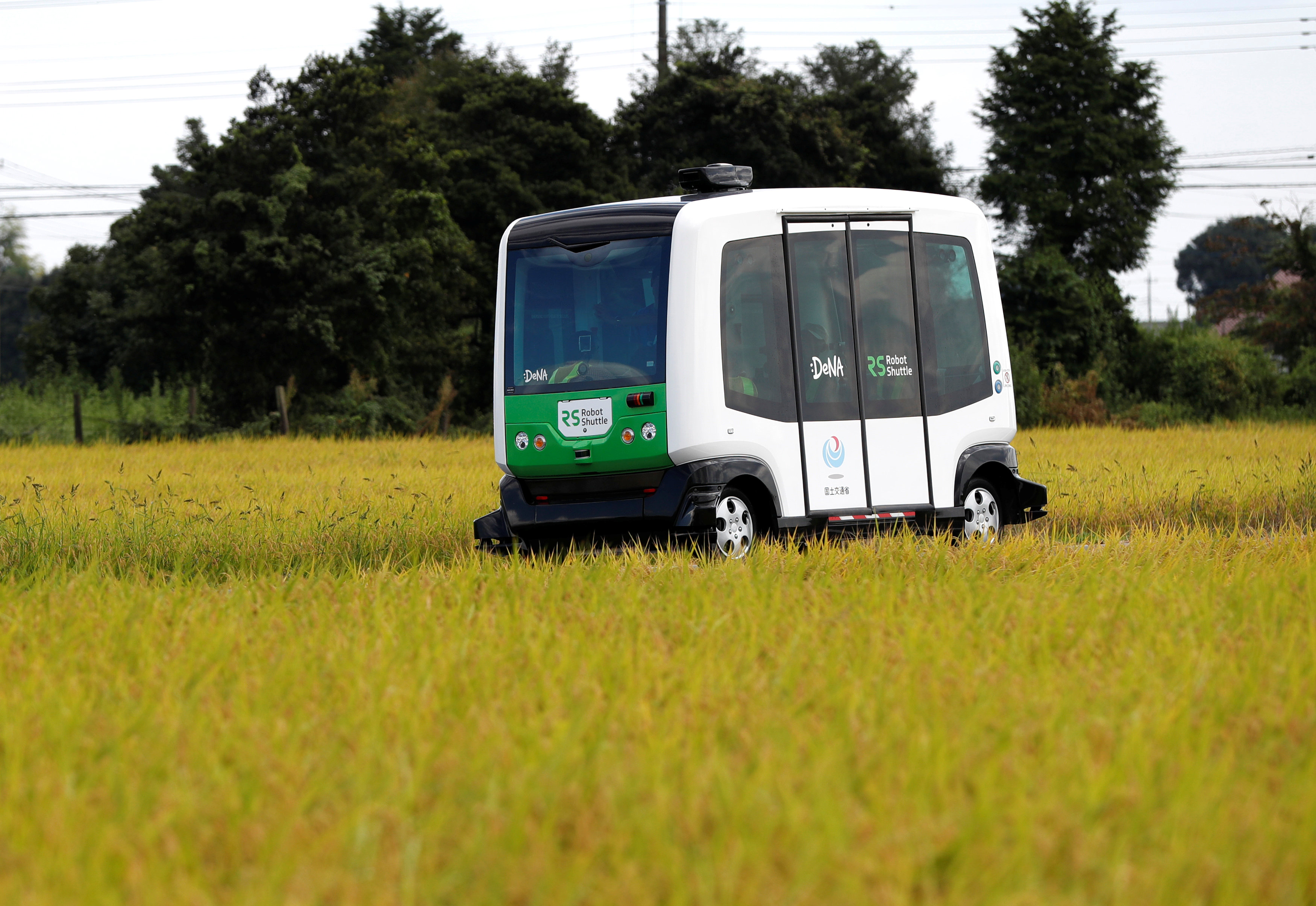 In pictures: Japan starts trials of driverless shuttle bus