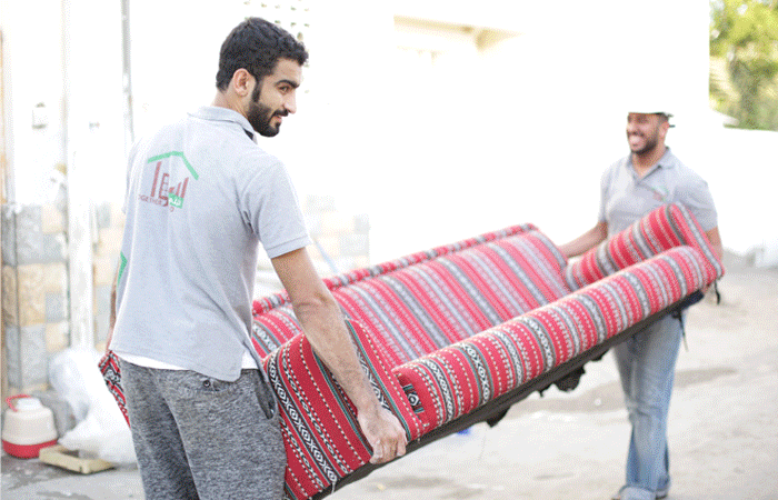 Omani volunteers from Together We Build repair Wadi Kabir house