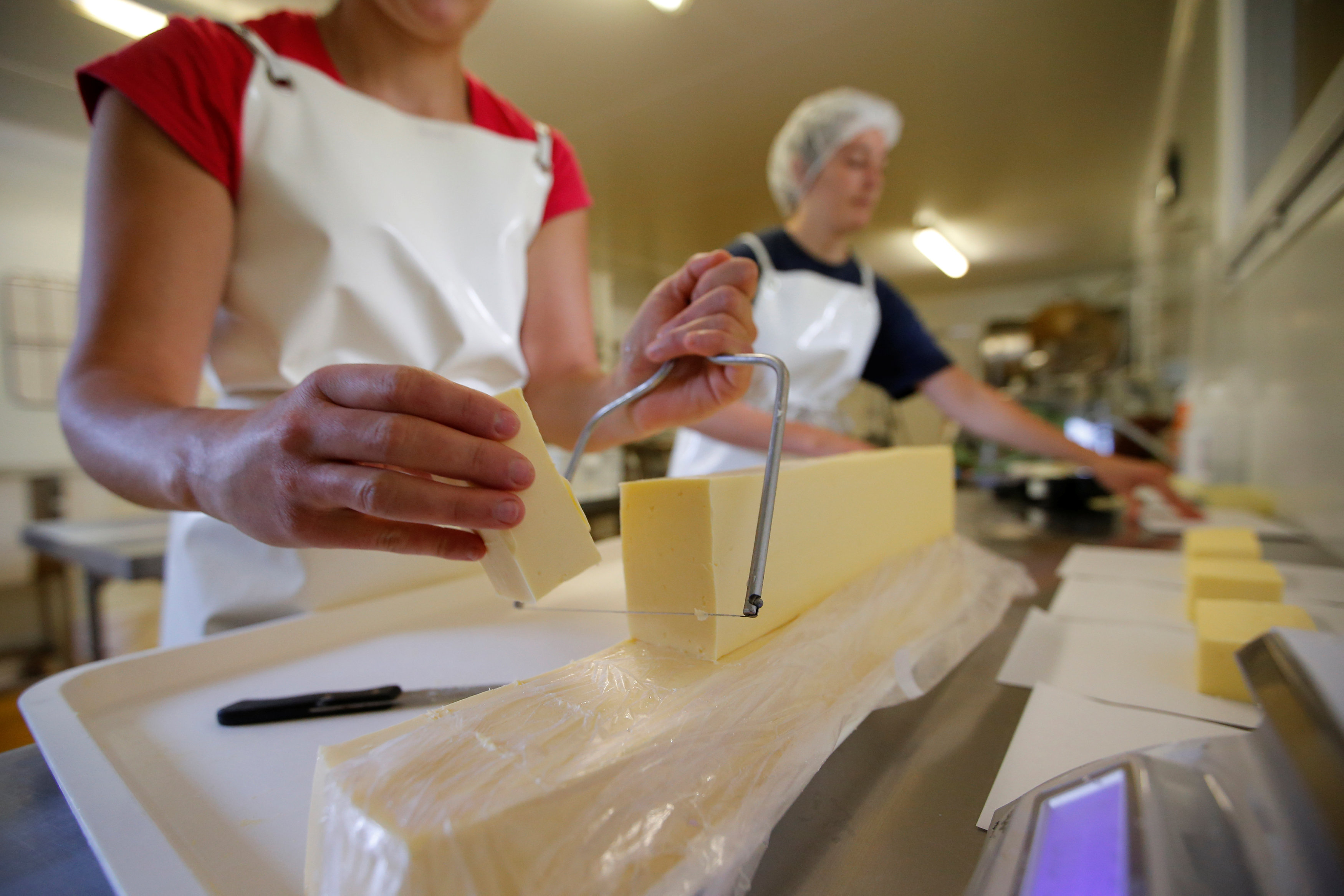 In pictures: Preparation of organic unpasteurised butter at a France milk farm