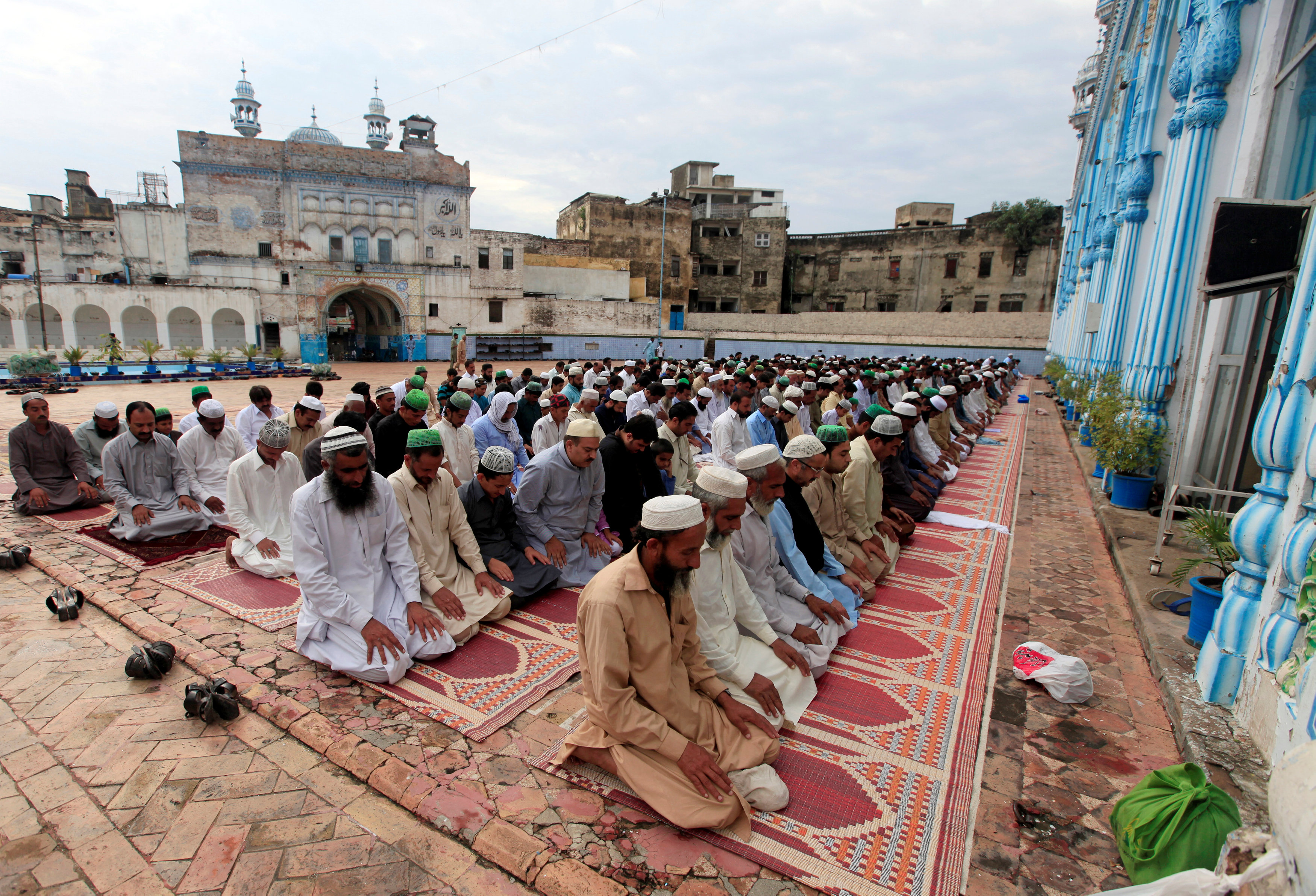 Pakistanis celebrate Eid Al Adha with prayer and sacrifices
