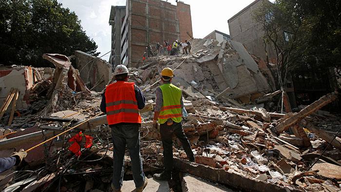 Strong quake near Mexico City kills almost 150, rescuers dig through collapsed buildings