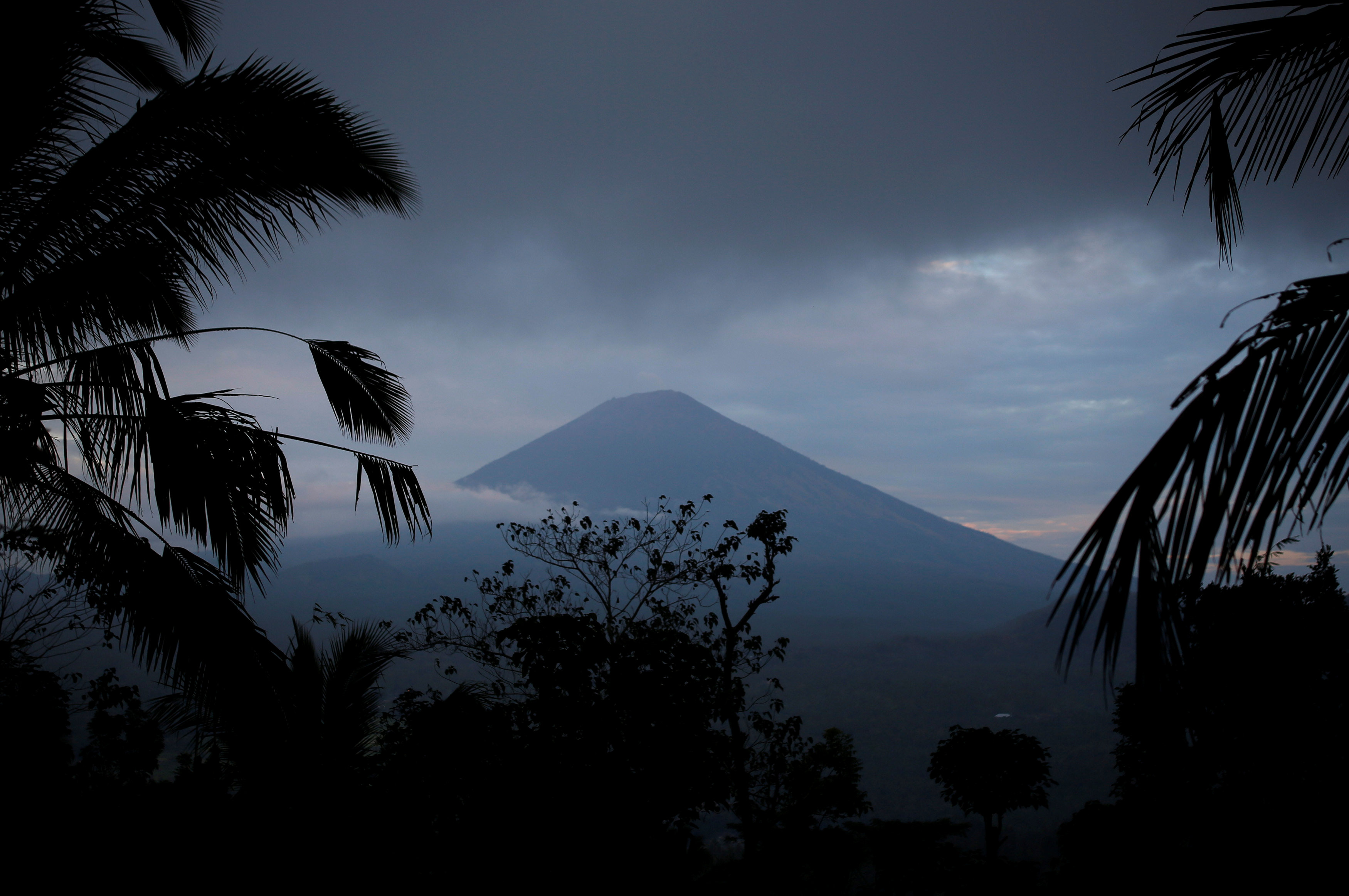 Bali's rumbling volcano sparks travel warnings from U.S, UK, Australia and Singapore