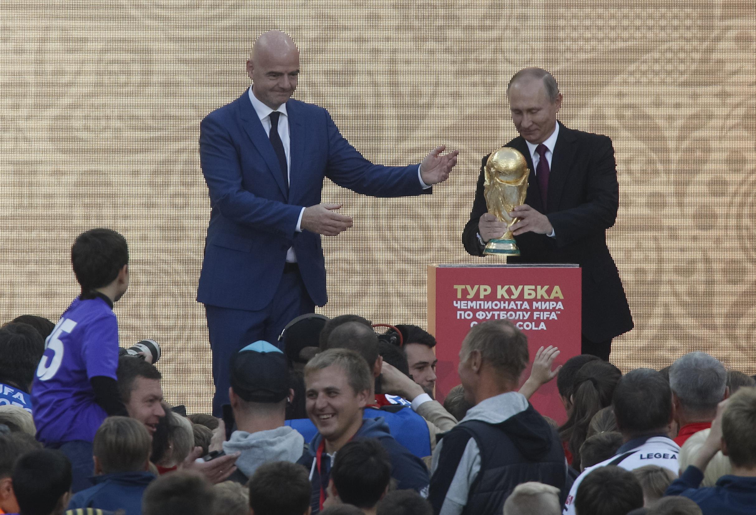 Football: Putin, FIFA chief Infantino send main trophy on Russia tour before 2018 World Cup
