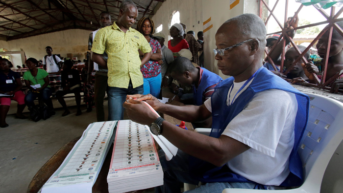 Liberians hope for peace in vote still haunted by civil war