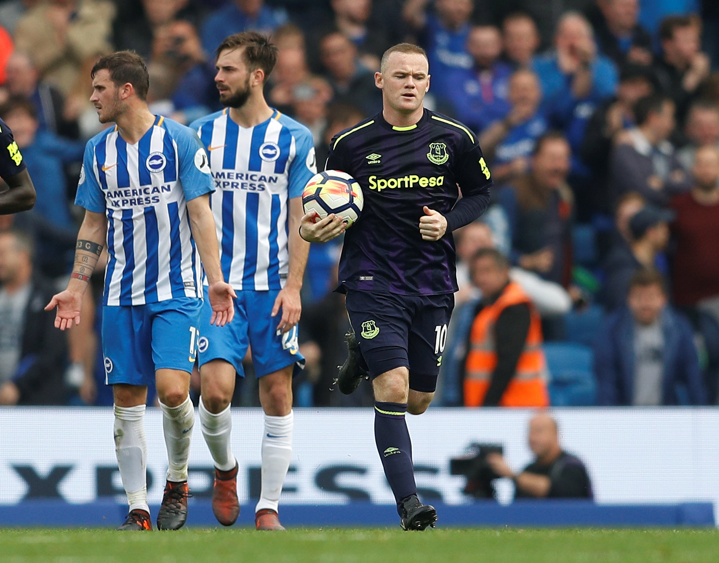Football: Late Rooney penalty rescues draw for Everton at Brighton