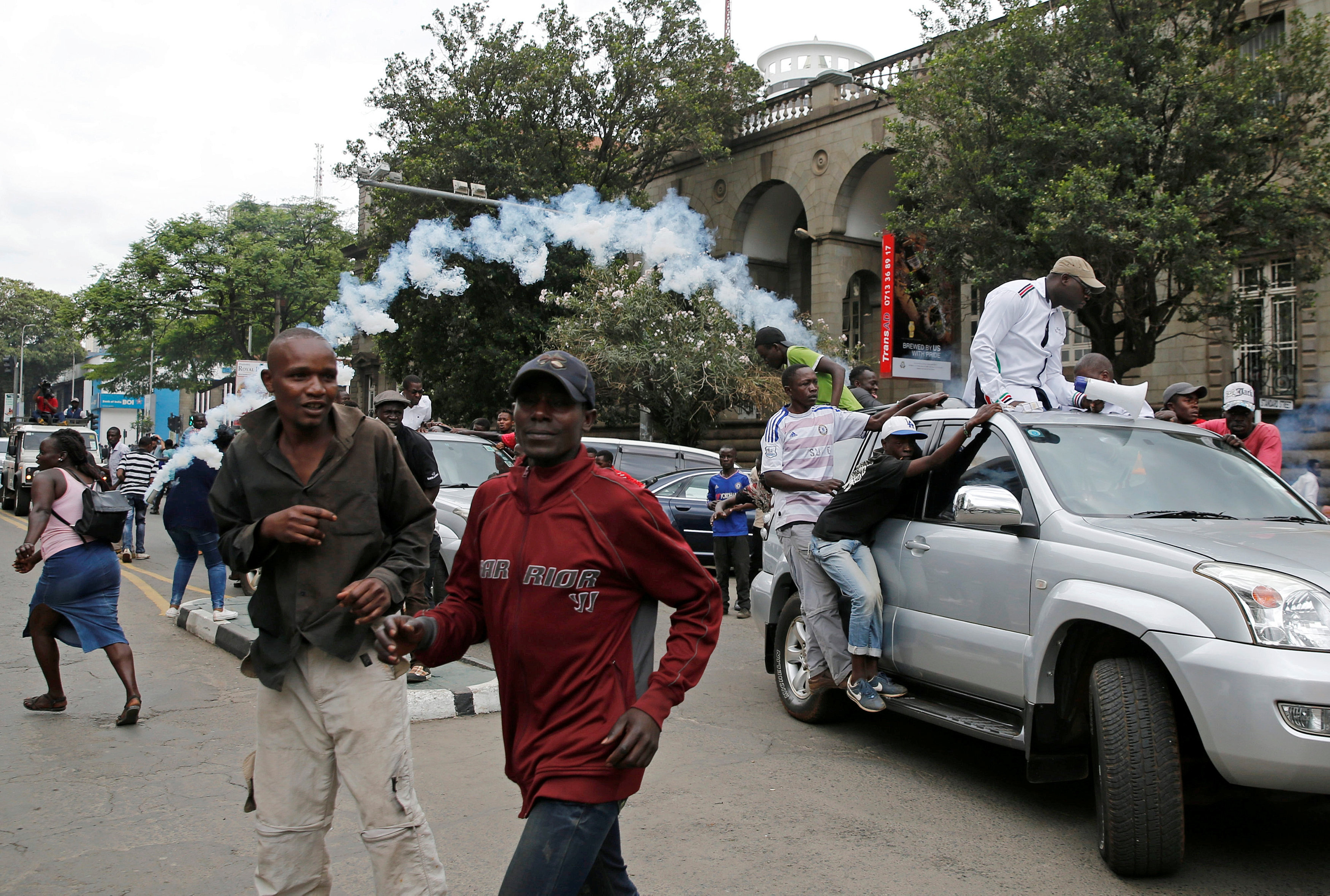 Kenya police disperse demonstrators as Odinga tempers poll protest call