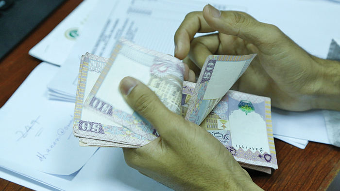 Expats expected to spend more as salary cap for family status cut in Oman