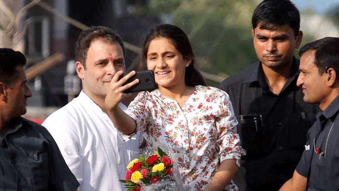 Girl climbs Rahul's van to click selfie with him in Gujarat